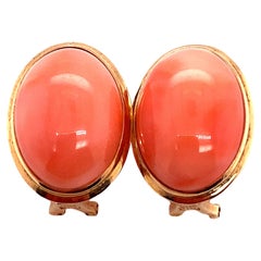 Circa 1920s Oval Orange Coral Button Earrings in 14 Karat Gold