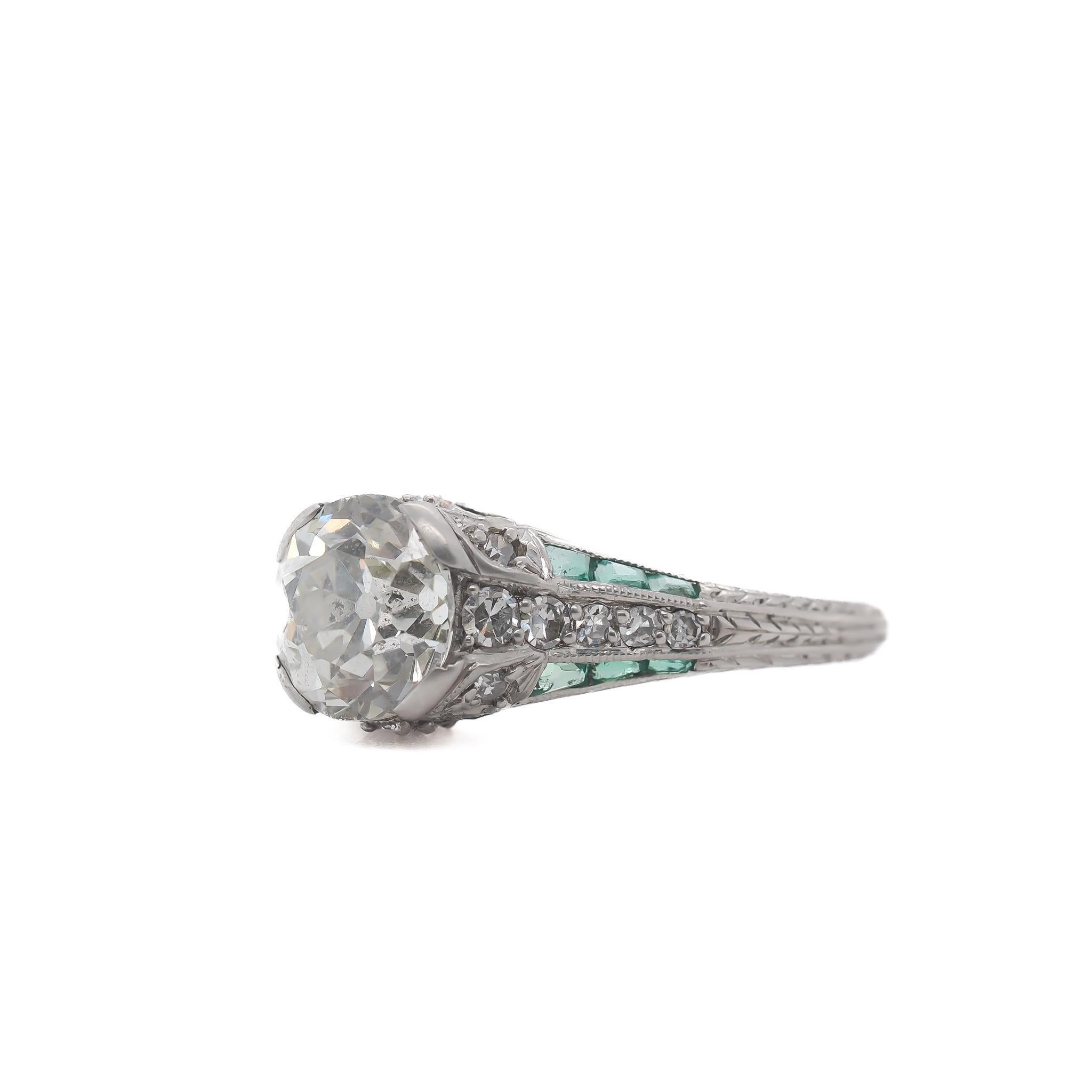 Year: 1920s

Item Details:
Ring Size: 6.5
Metal Type: Platinum [Hallmarked, and Tested]
Weight: 4.7 grams

Center Diamond Details:

GIA Report#: 2231441768
Weight: 2.03ct total weight
Cut: Old European Brilliant (Cushiony Shape)
Color: K
Clarity: