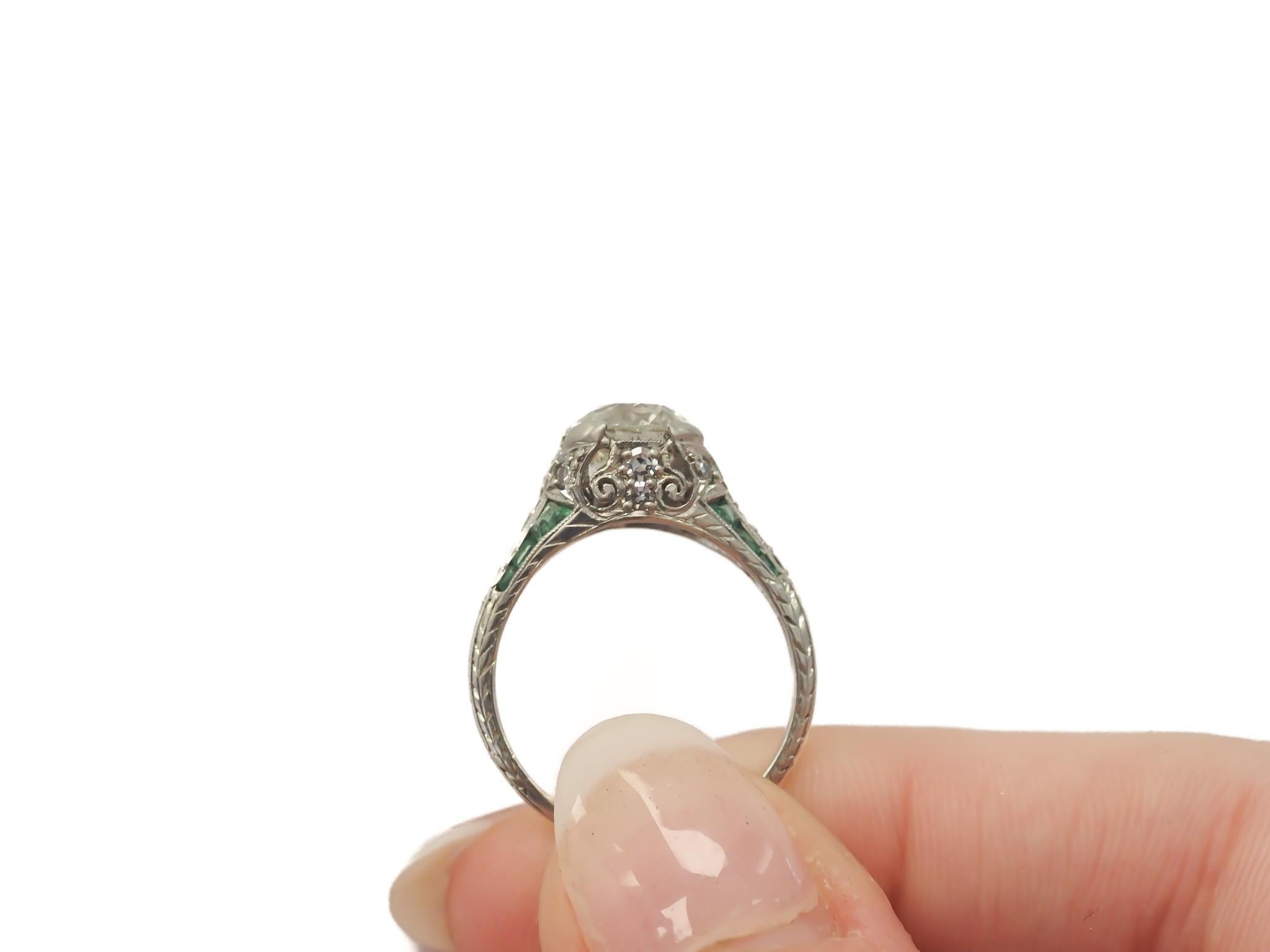 Circa 1920s Platinum 2.03ct Old European Cushion Diamond and Emerald Engagement For Sale 1