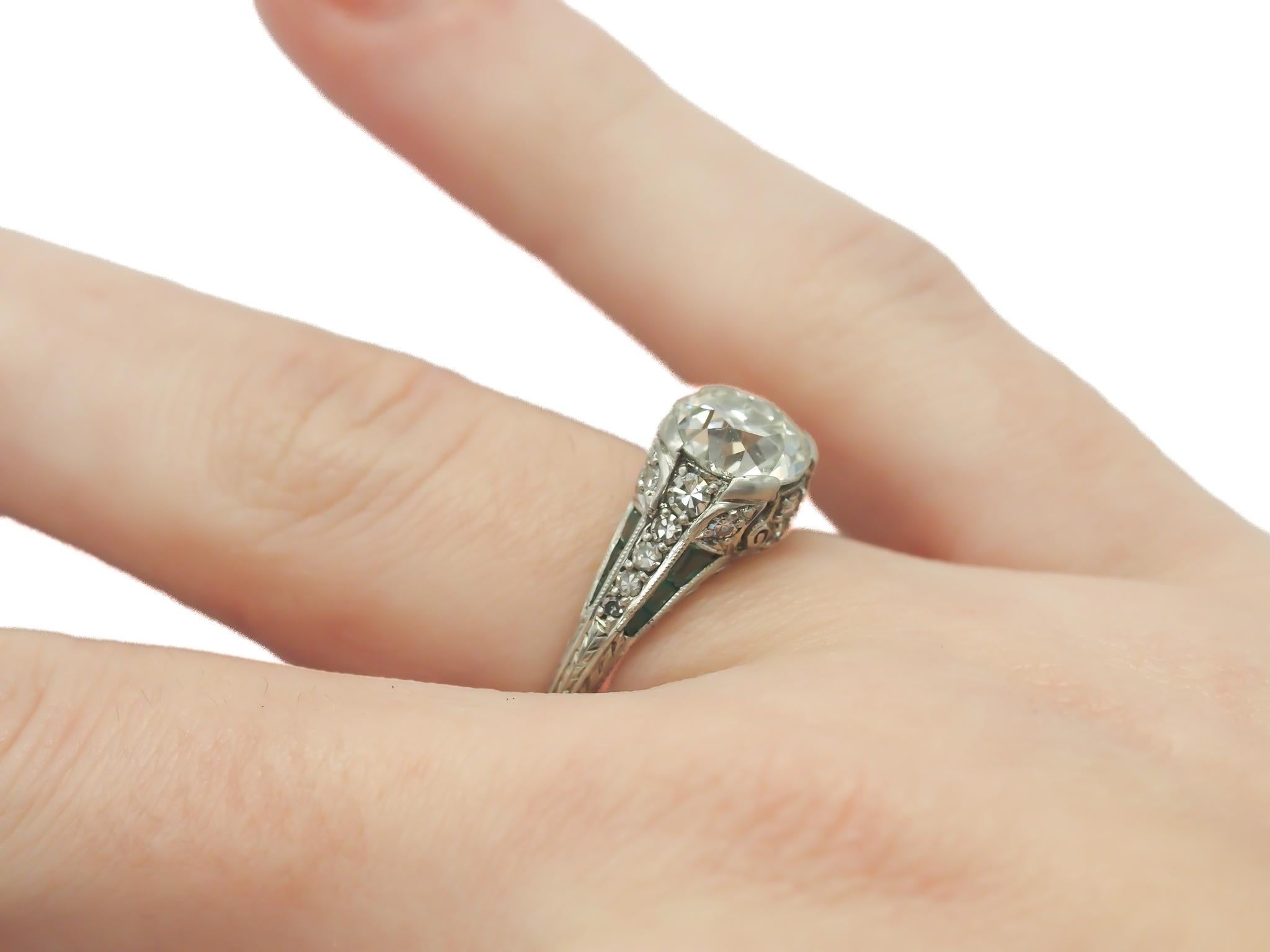Circa 1920s Platinum 2.03ct Old European Cushion Diamond and Emerald Engagement For Sale 3