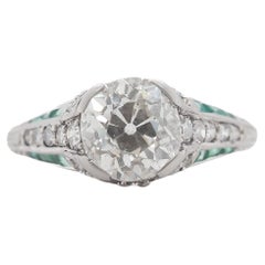Antique Circa 1920s Platinum 2.03ct Old European Cushion Diamond and Emerald Engagement