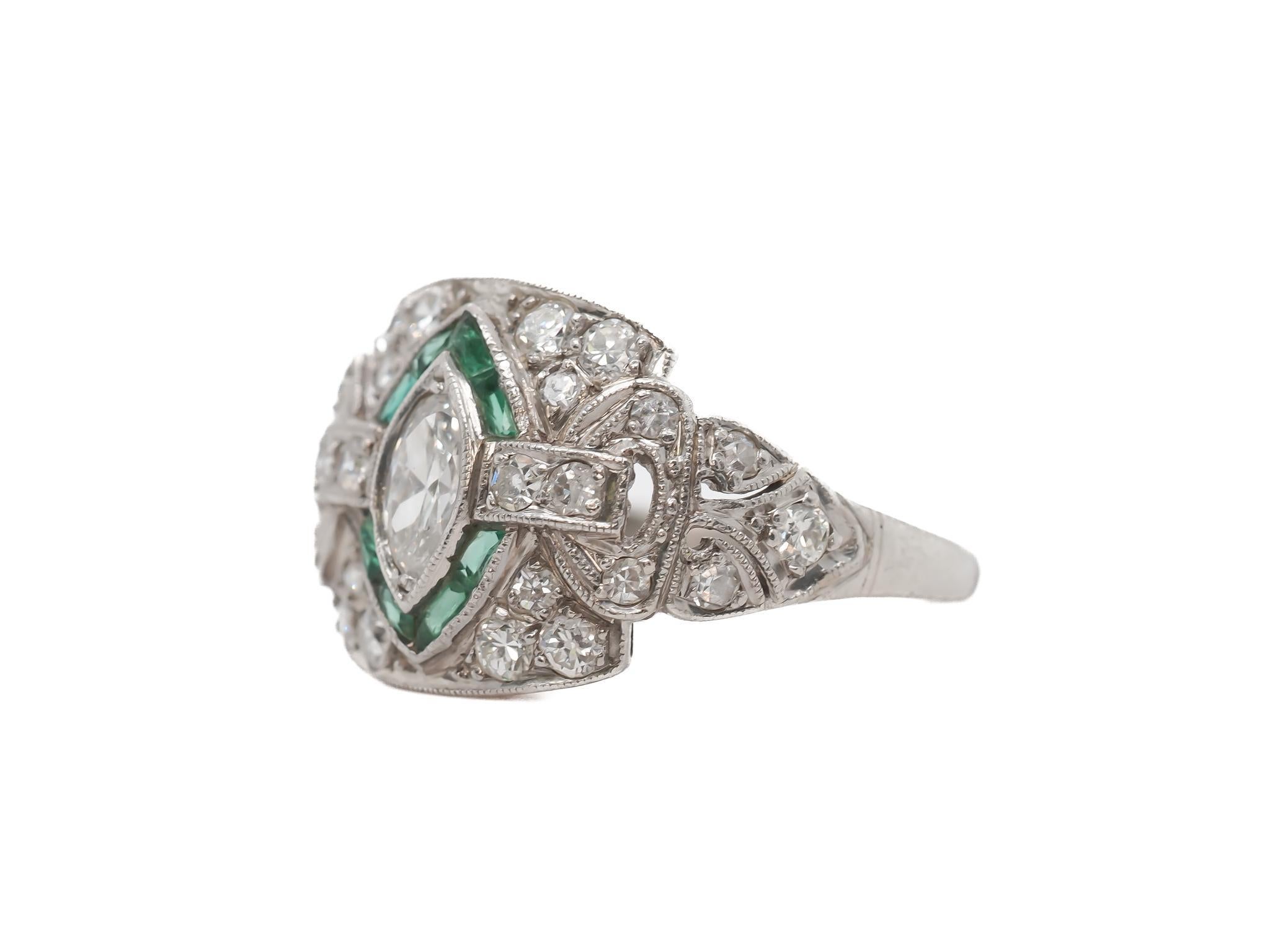 Circa 1920s Platinum Antique Marquise Diamond and Emerald Engagement Ring - VEG#40a

Item Details:
Year: 1920s
Ring Size: 5.25
Metal Type: Platinum [Hallmarked, and Tested]
Weight: 4.1 grams

Center Diamond Details:
Weight: .30ct total weight
Cut: