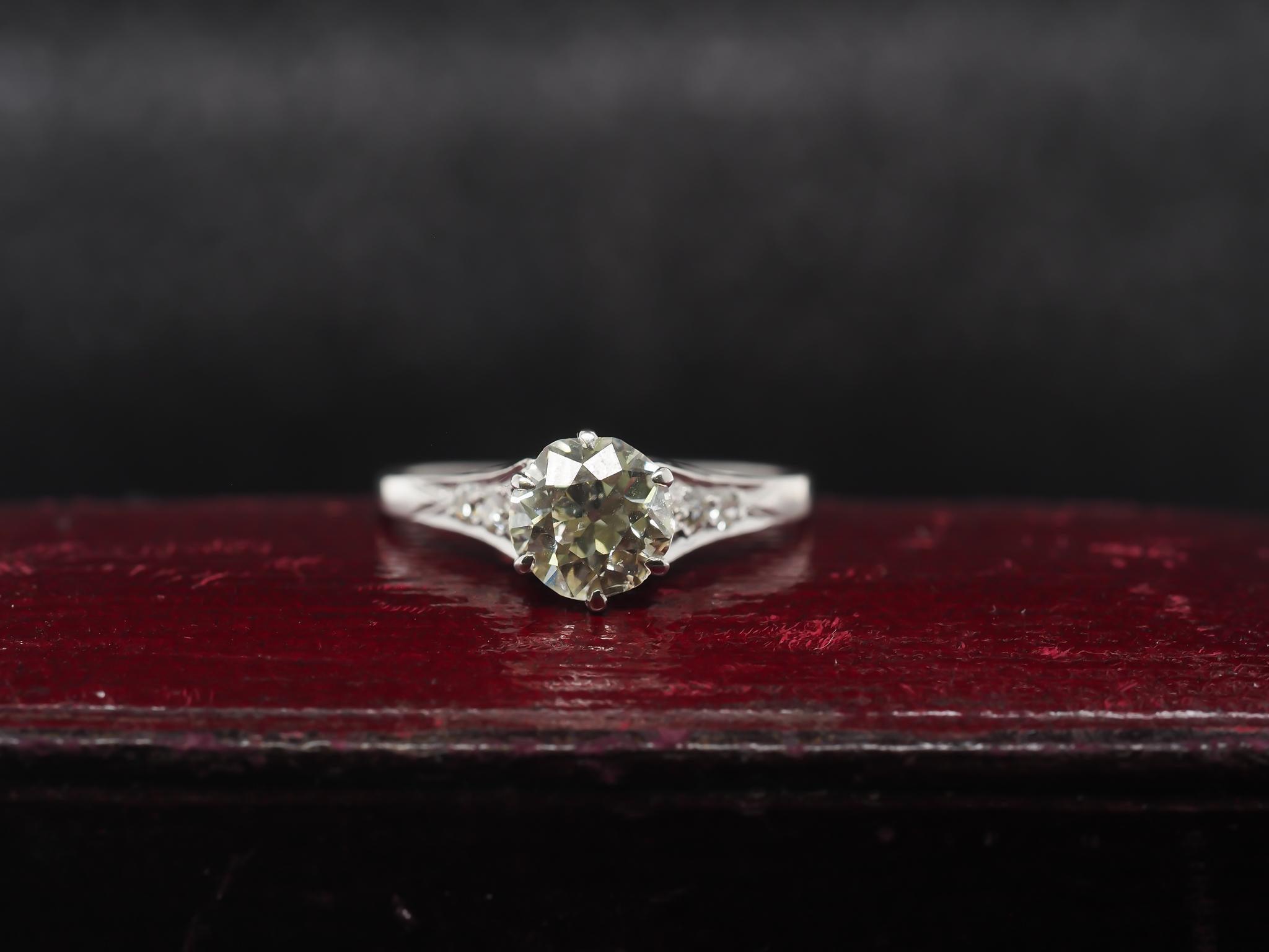 Year: 1920s

Item Details:
Ring Size: 6.5 (Sizable)
Metal Type: Platinum [Hallmarked, and Tested]
Weight: 2.4 grams

Diamond Details: 1.06ct, Old European brilliant, Light Yellow (O/P) Color, SI2 Clarity

Band Width: 1.3mm
Condition: Excellent