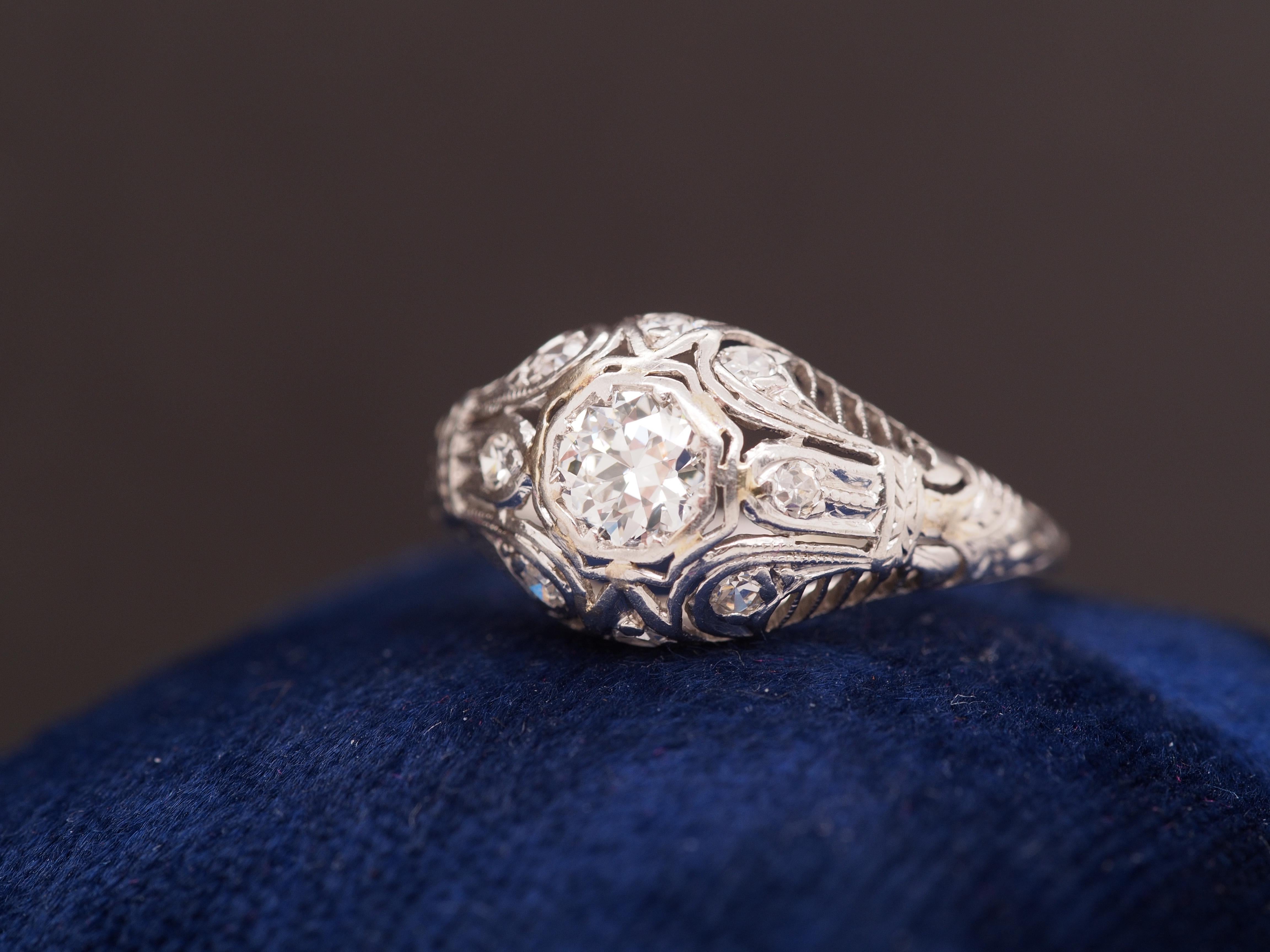 Year: 1920s
Item Details:
Ring Size: 6
Metal Type: Platinum [Hallmarked, and Tested]
Weight: 2.6 grams
Diamond Details:
Center Diamond: Natural Diamond, Old European cut, .35ct total weight, G Color, VS Clarity
Side Diamonds: .15ct total weight, Old