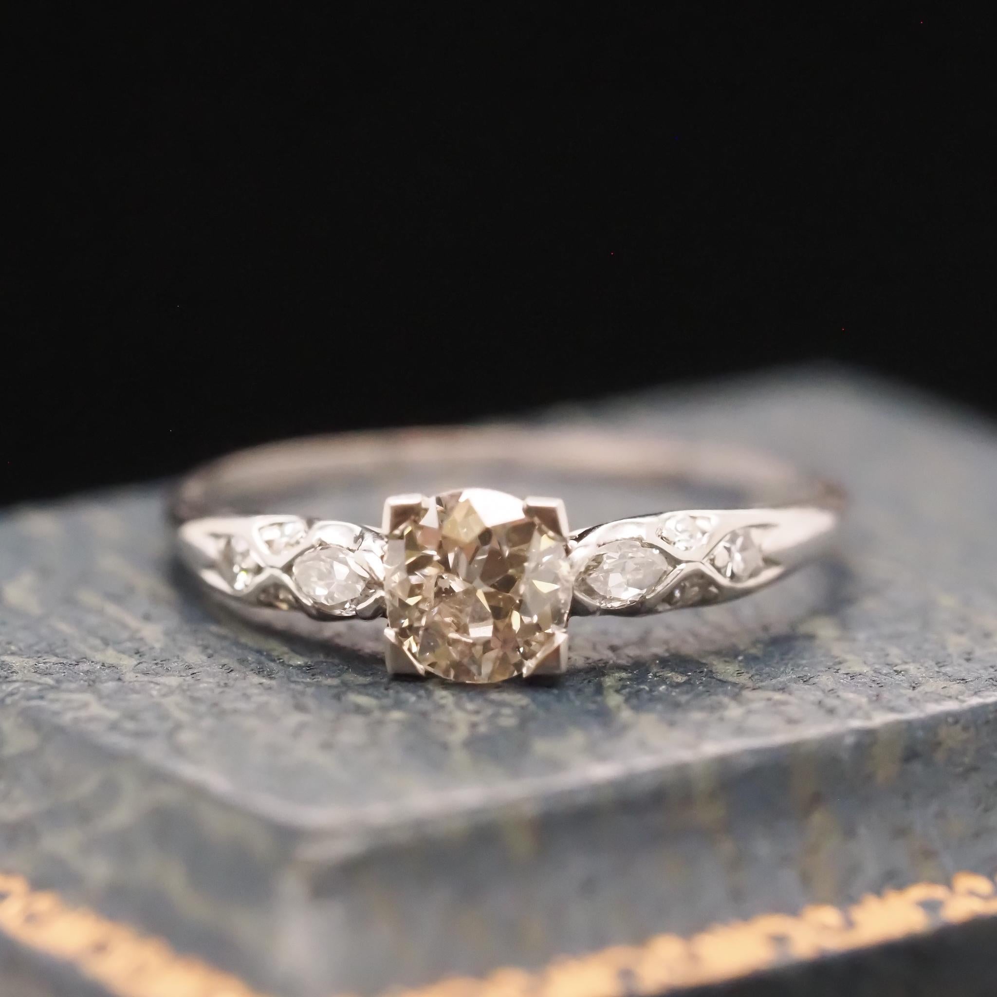 Item Details:
Metal Type: Platinum [Hallmarked, and Tested]
Weight: 2.8 grams
Center Diamond Details: .60ct, Old European Brilliant, H Color, SI1 Clarity
Side Diamonds: Antique Marquise and Antique Single Cut, .10ct total weight, G Color, VS