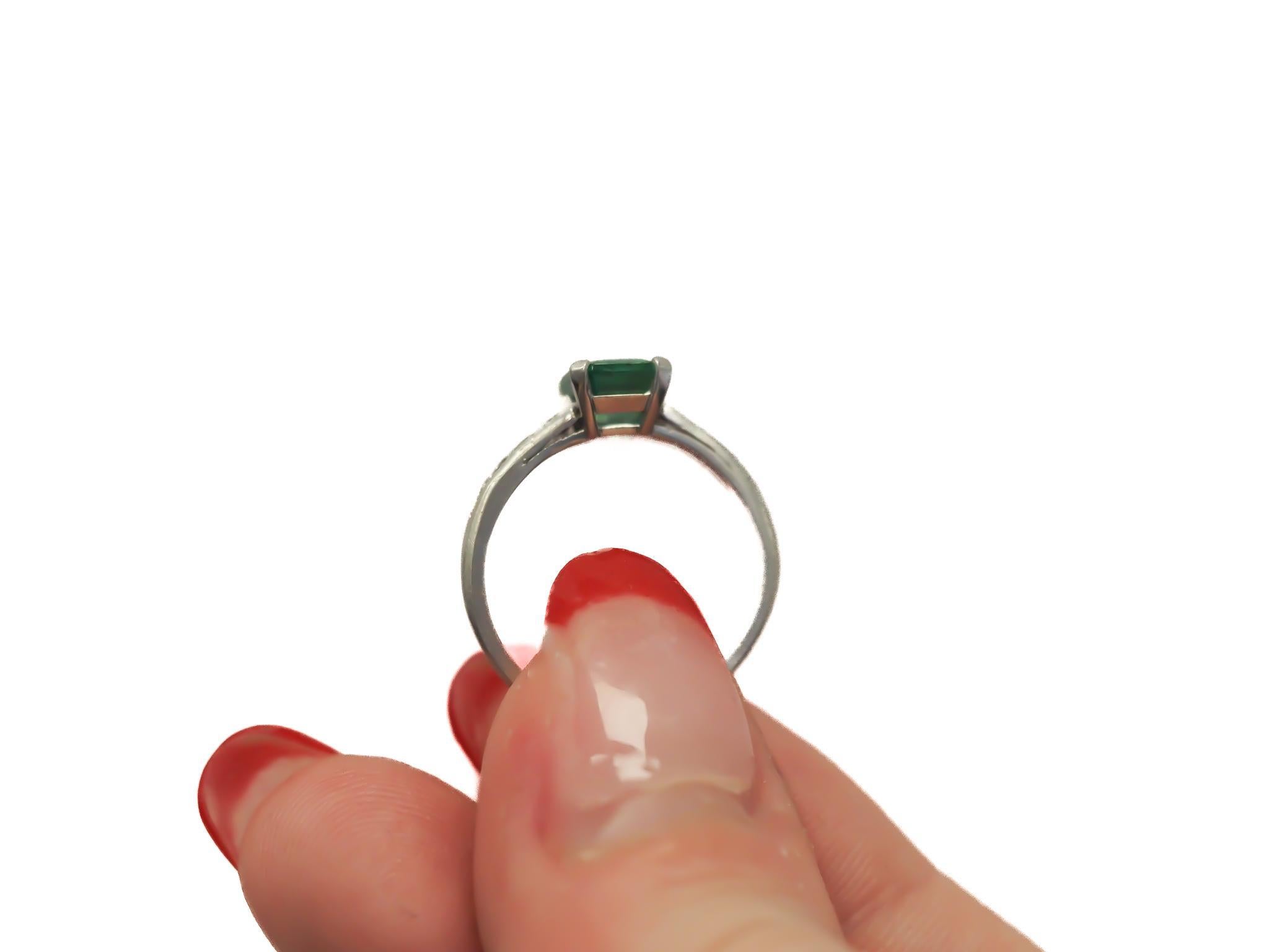 Women's Circa 1920s Platinum Art Deco Emerald and Diamond Engagement Ring For Sale