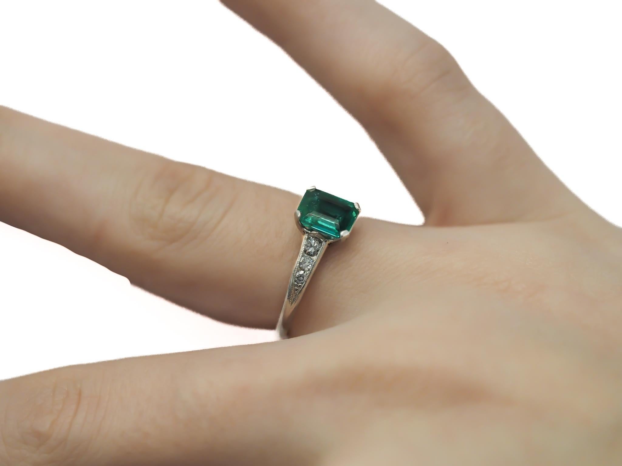 Circa 1920s Platinum Art Deco Emerald and Diamond Engagement Ring For Sale 2