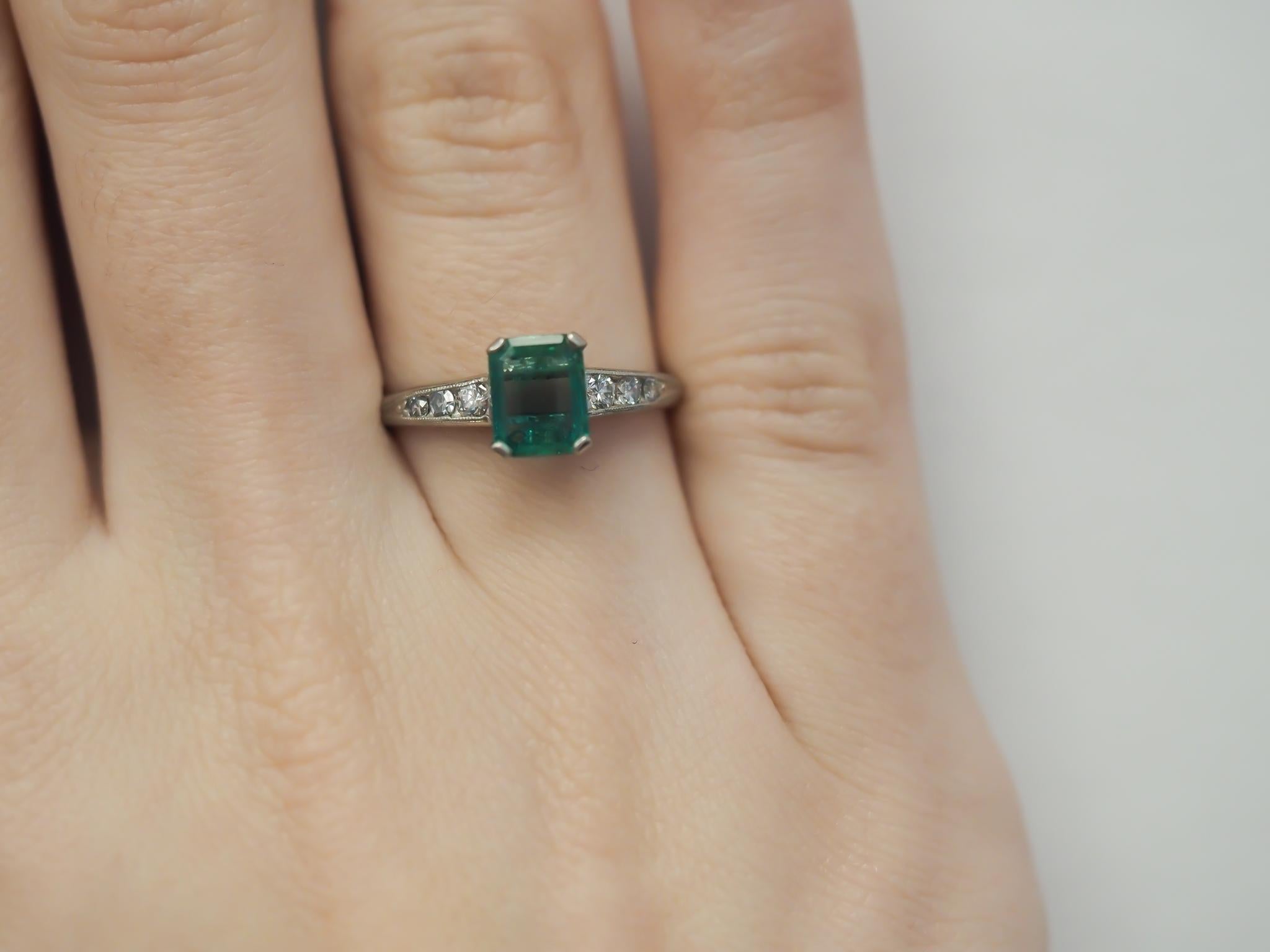 Circa 1920s Platinum Art Deco Emerald and Diamond Engagement Ring For Sale 3