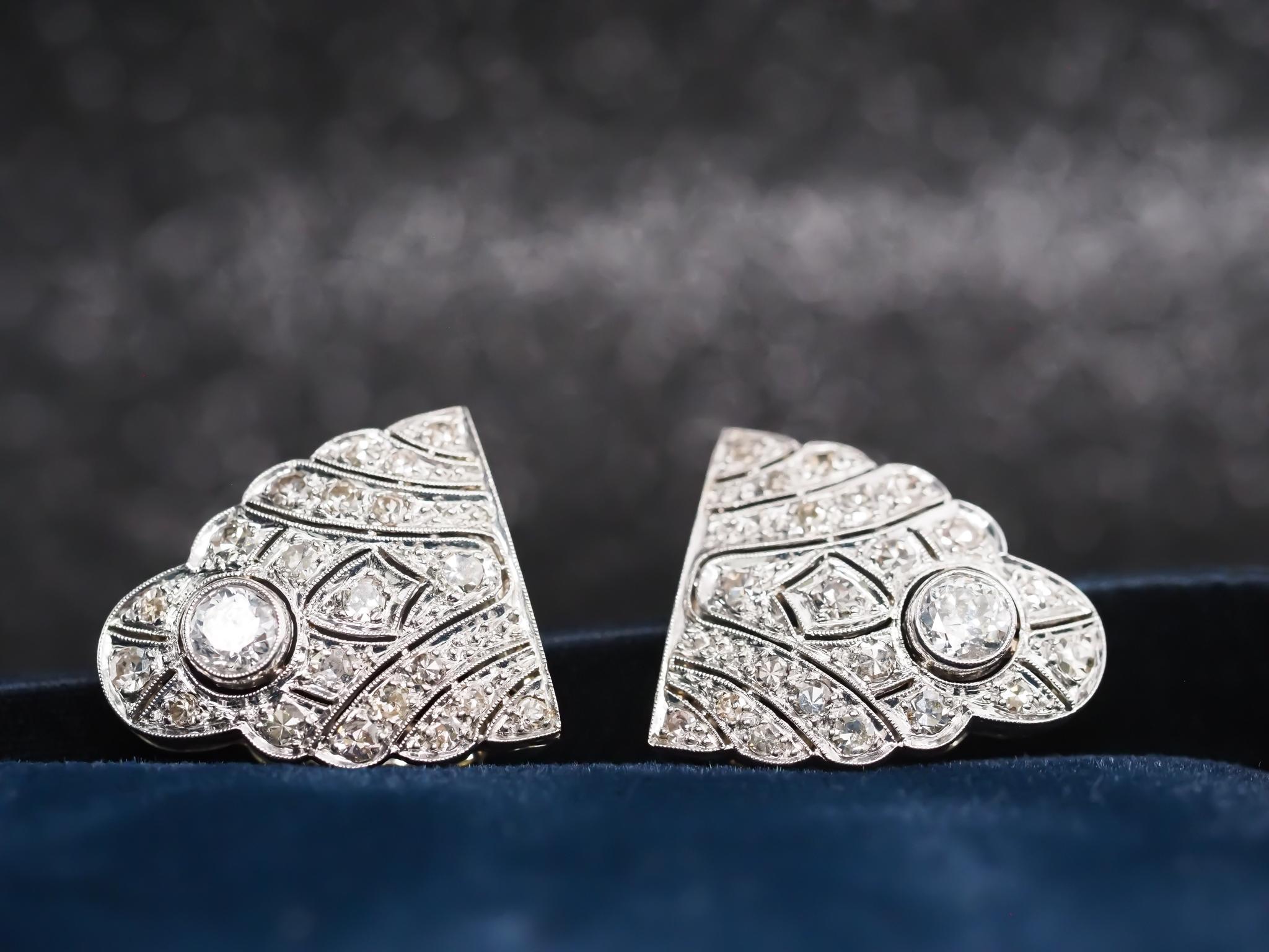 Item Details:
Metal Type: Platinum [Hallmarked, and Tested]
Weight: 8.8 grams
Diamond Details: 1.00ct total weight, old European brilliant cut diamonds, G Color, VS Clarity.
Clip Measurements:
Diameter: 1.5 inches total , .75 inch each.
Condition: