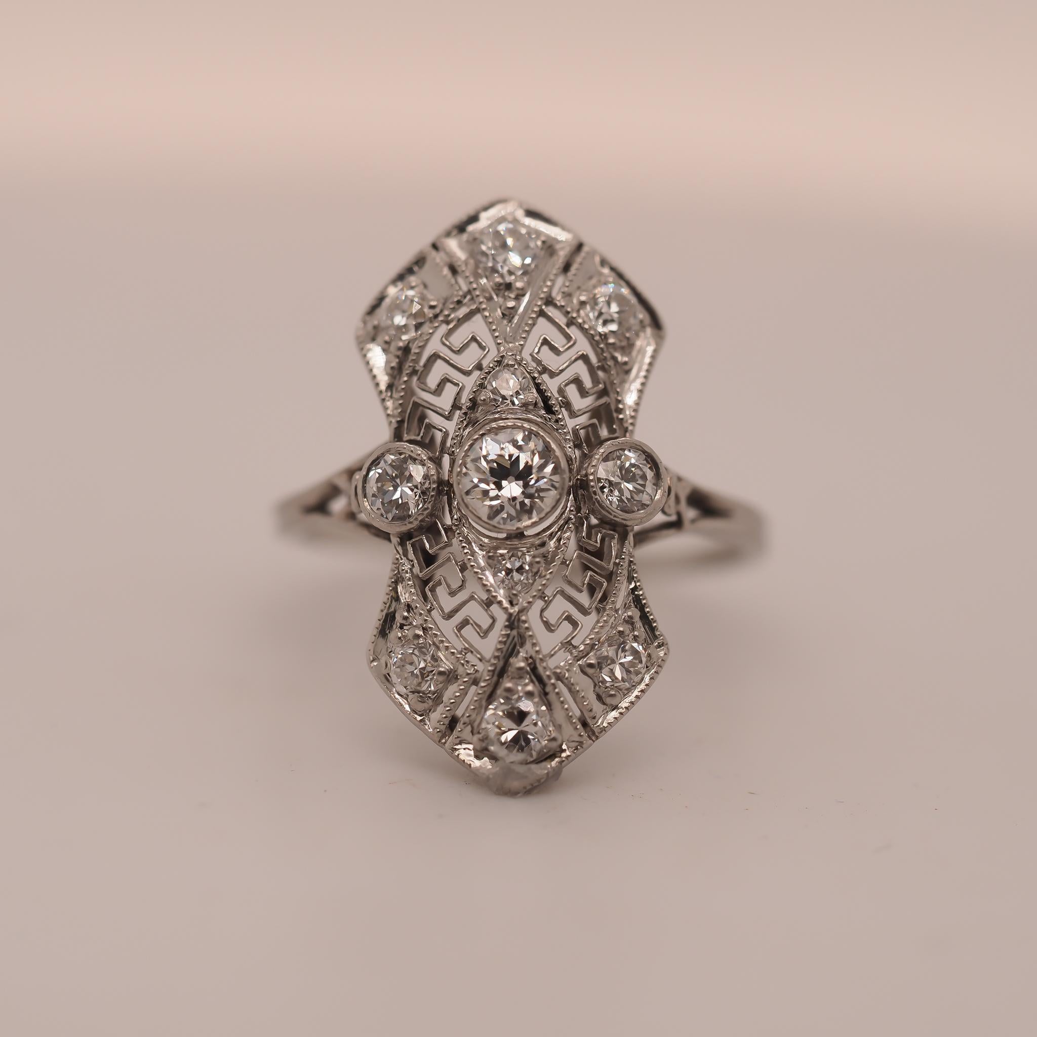 Year: 1920s
Item Details:
Ring Size: 5.75 (Sizable)
Metal Type: Platinum [Hallmarked, and Tested]
Weight: 3.4 grams
Diamond Details: .50ct total weight, Old European Brilliant Diamonds, F Color, VS Clarity
Band Width: 1mm
Condition: Excellent