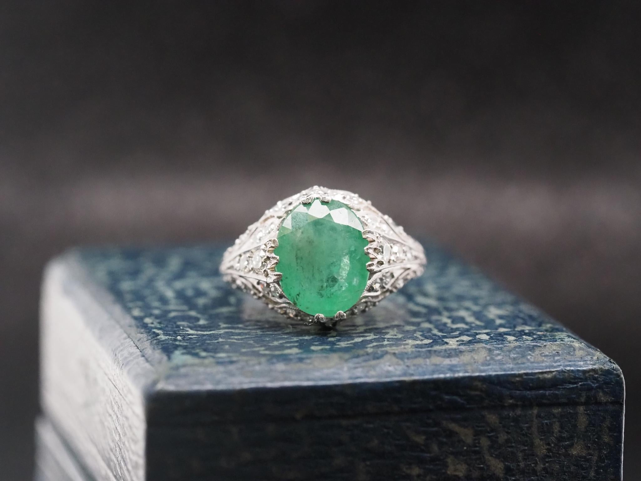 Year: 1920s
Item Details:
Ring Size: 6.5 (Sizable)
Metal Type: Platinum [Hallmarked, and Tested]
Weight: 5.1 grams
Emerald Details: 3.00ct approximate. Green color. Natural Emerald, Colombian origin.
Side Stone Details: Old European Diamond, .40ct