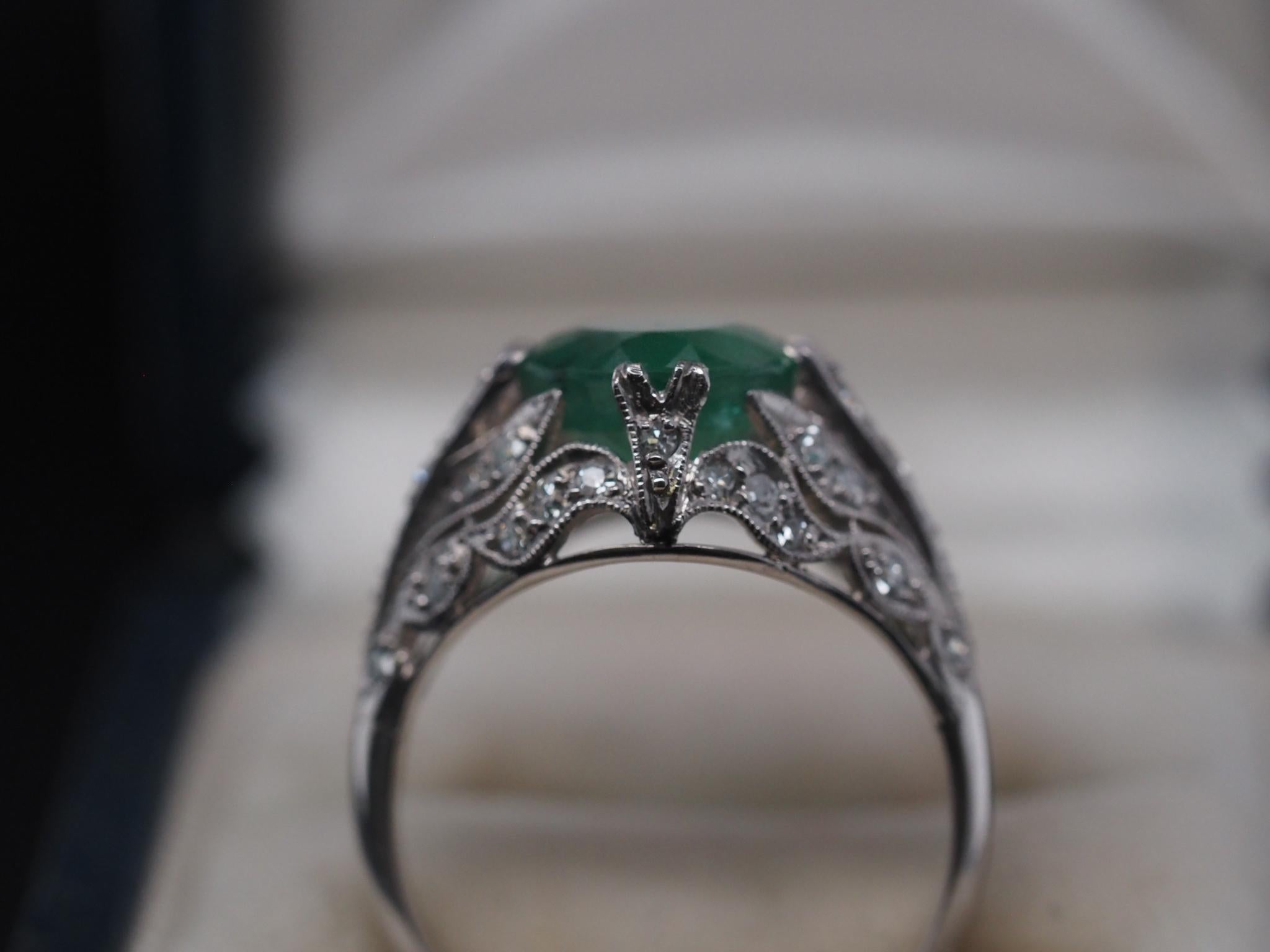 Circa 1920s Platinum Edwardian Emerald Diamond Engagement Ring In Good Condition For Sale In Hicksville, NY