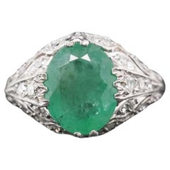 Circa 1920 Platinum Edwardian Emerald Diamond Engagement Ring