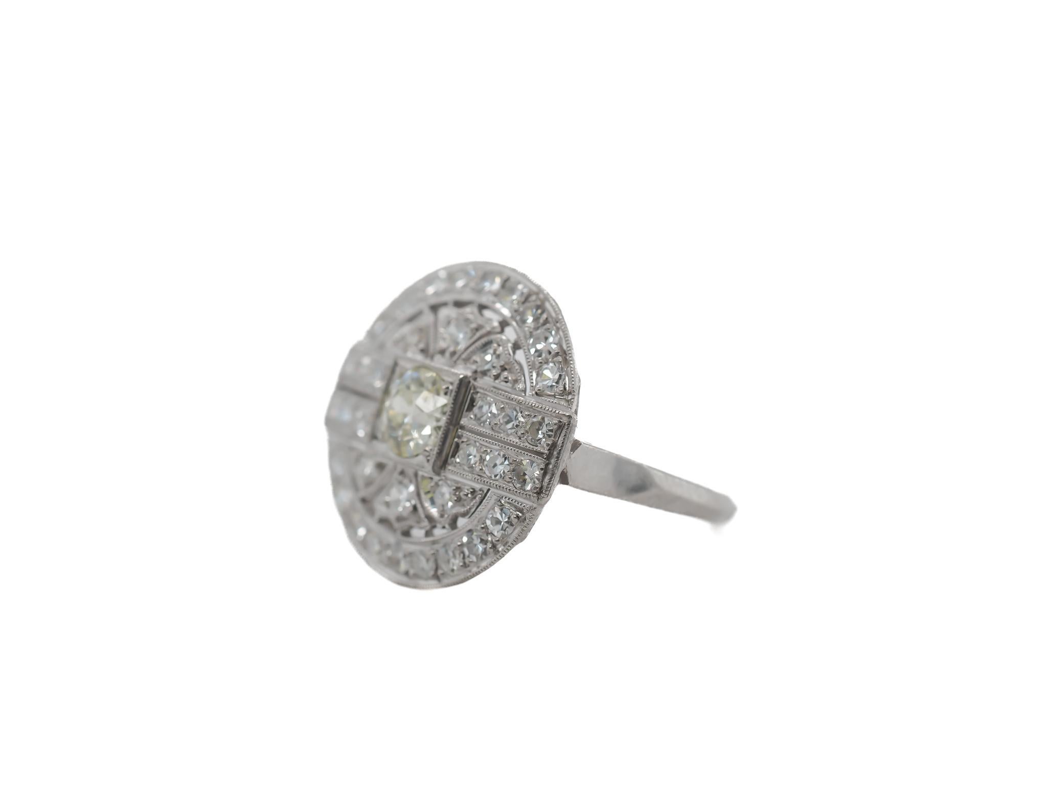 Year: 1920s
Item Details:
Ring Size: 6
Metal Type: Platinum [Hallmarked, and Tested]
Weight: 4.7 grams
Diamond Details:
Weight: 1.10ct total weight
Cut: Old European brilliant
Color: Center Stone is J Color, Side stones all F-G Color.
Clarity: