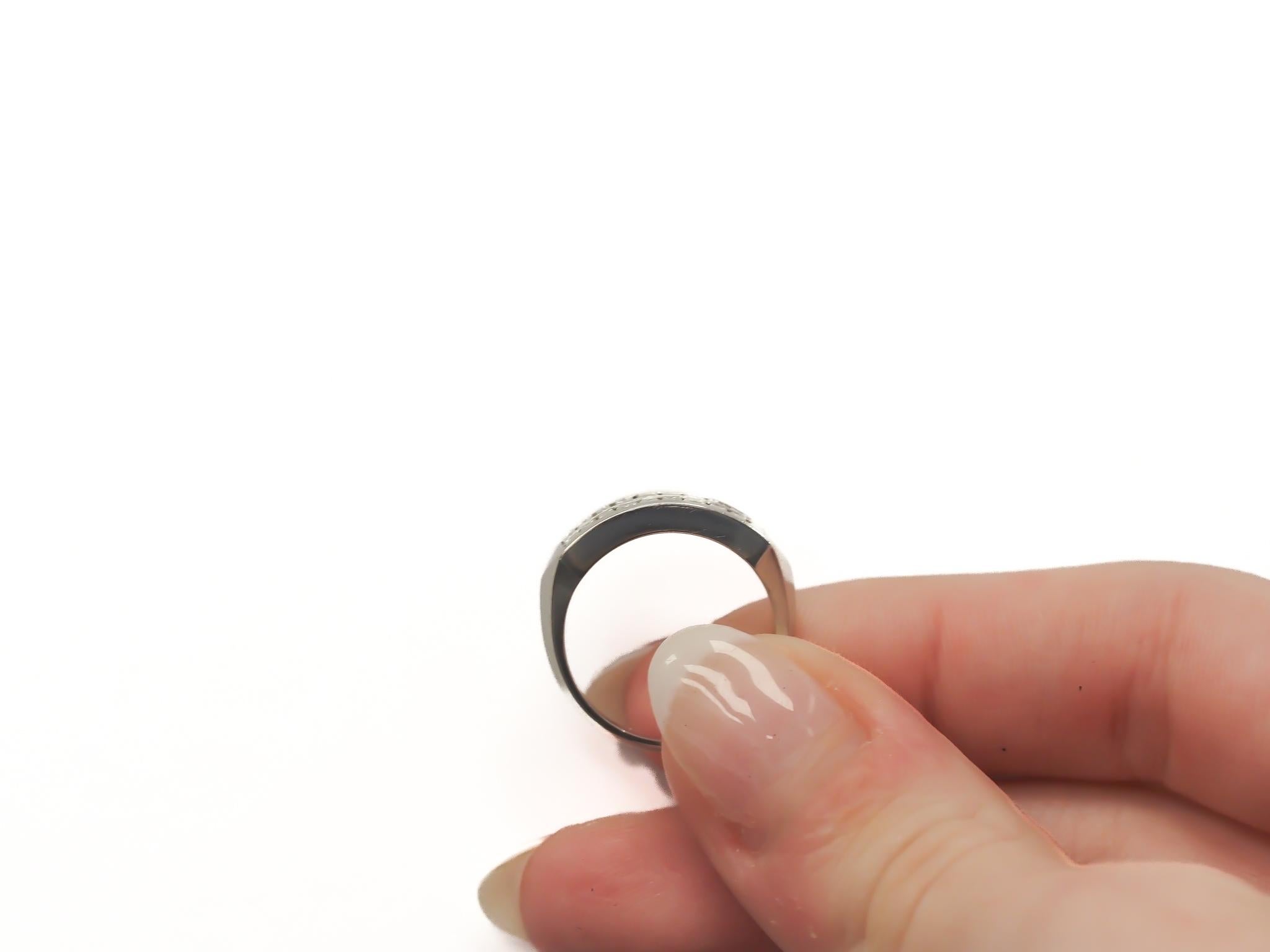 Year: 1920s

Item Details:
Ring Size: 7
Metal Type: Platinum [Hallmarked, and Tested]
Weight: 9.6 grams

Diamond Details:
Weight: 2.00ct total weight
Cut: Antique Step Cut
Color: F
Clarity: VS
Type: Natural

Finger to Top of Stone Measurement: