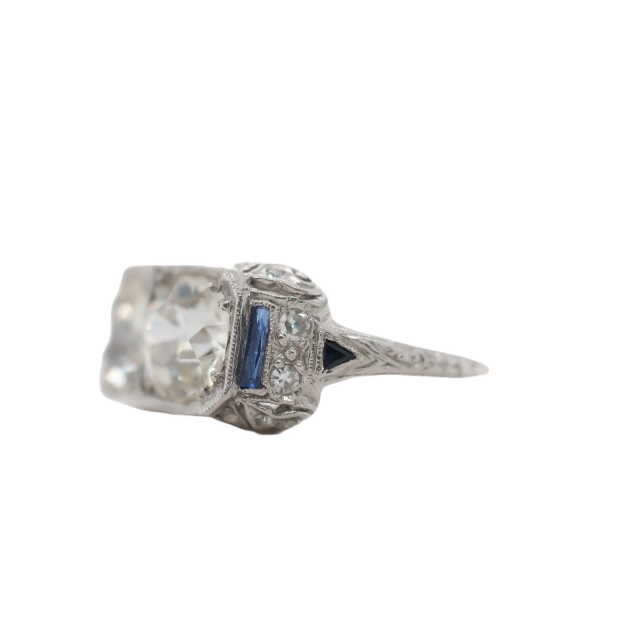 Year: 1920s
Item Details:
Ring Size: 7.25
Metal Type: Platinum [Hallmarked, and Tested]
Weight: 5.6 grams
Diamond Details:
Weight: 2.65ct total weight between both diamonds, 1.32ct and 1.31ct each.
Cut: Old European brilliant
Color: L/M
Clarity: