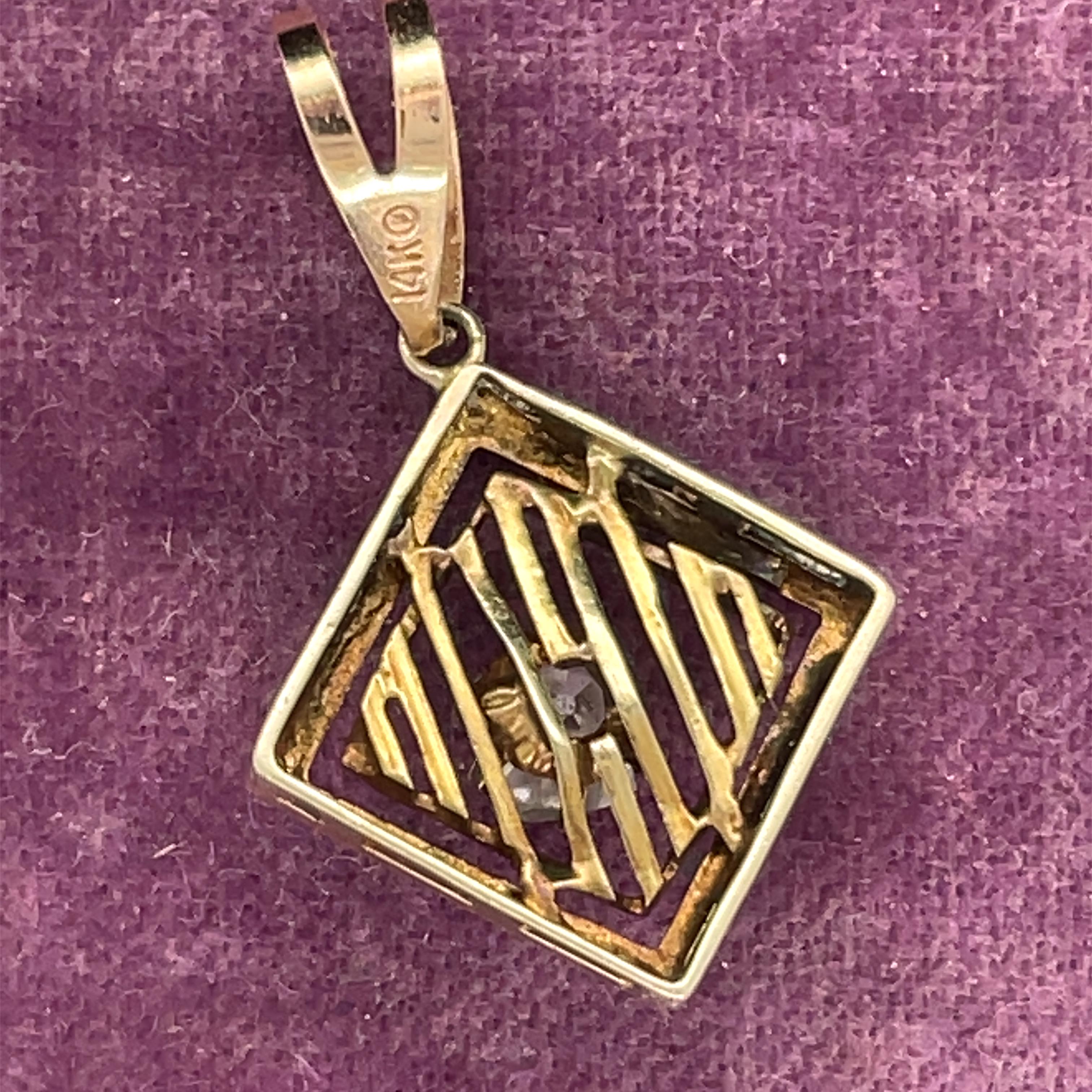 Item Details:
Metal Type: 14K Yellow Gold [Hallmarked, and Tested]
Weight: 1.50 grams

Center Diamond Details:
Weight: .20ct
Cut: Old Mine Brilliant (Antique Cushion)
Color: H
Clarity: VS

Pendant Measurement: .4 inch x .4 inch
Condition: Excellent
