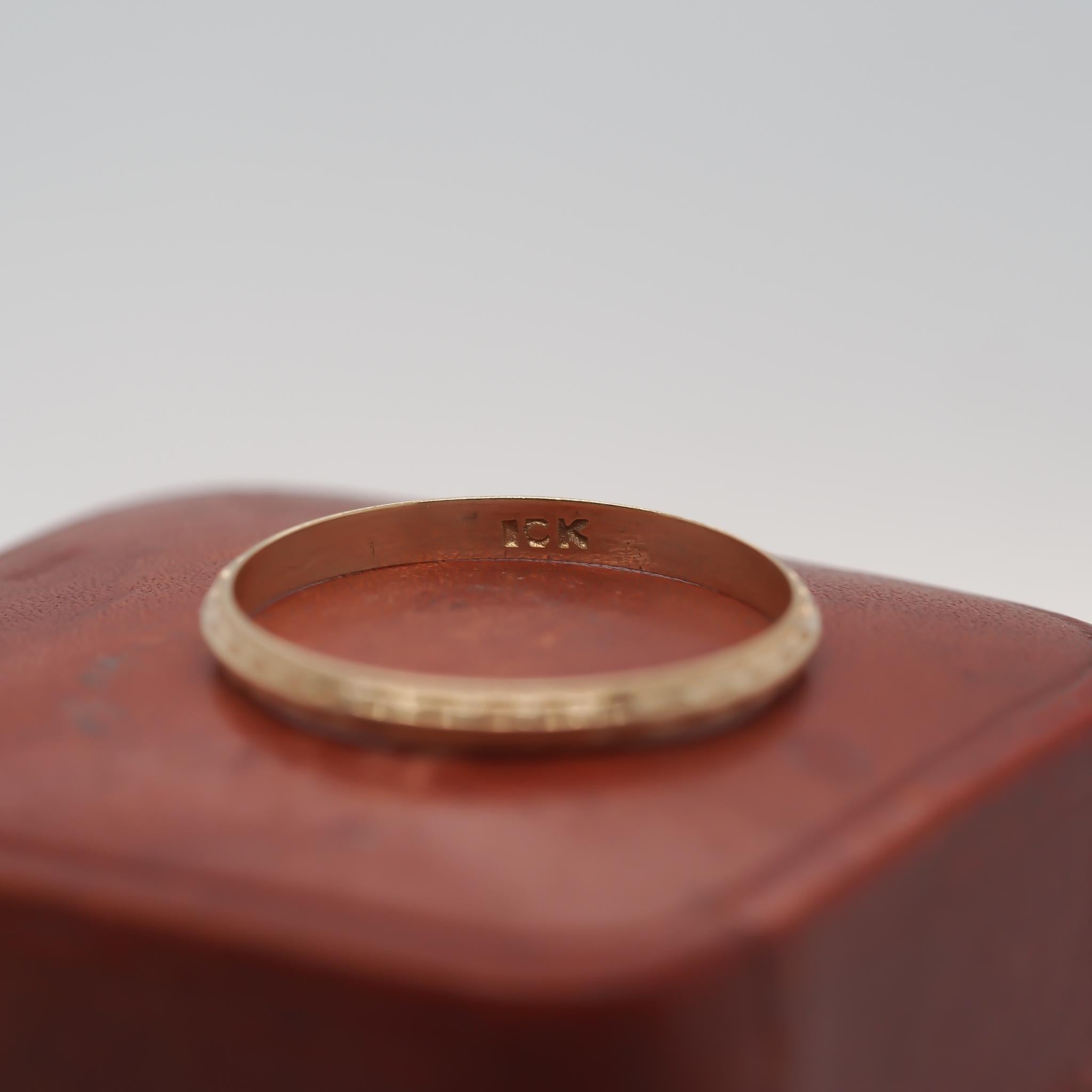 Year: 1920s
Item Details:
Ring Size: 6.5 (Sizable)
Metal Type: 10k yellow gold [Hallmarked, and Tested]
Weight: 0.7 grams
Band Width: 2mm
Condition: Excellent