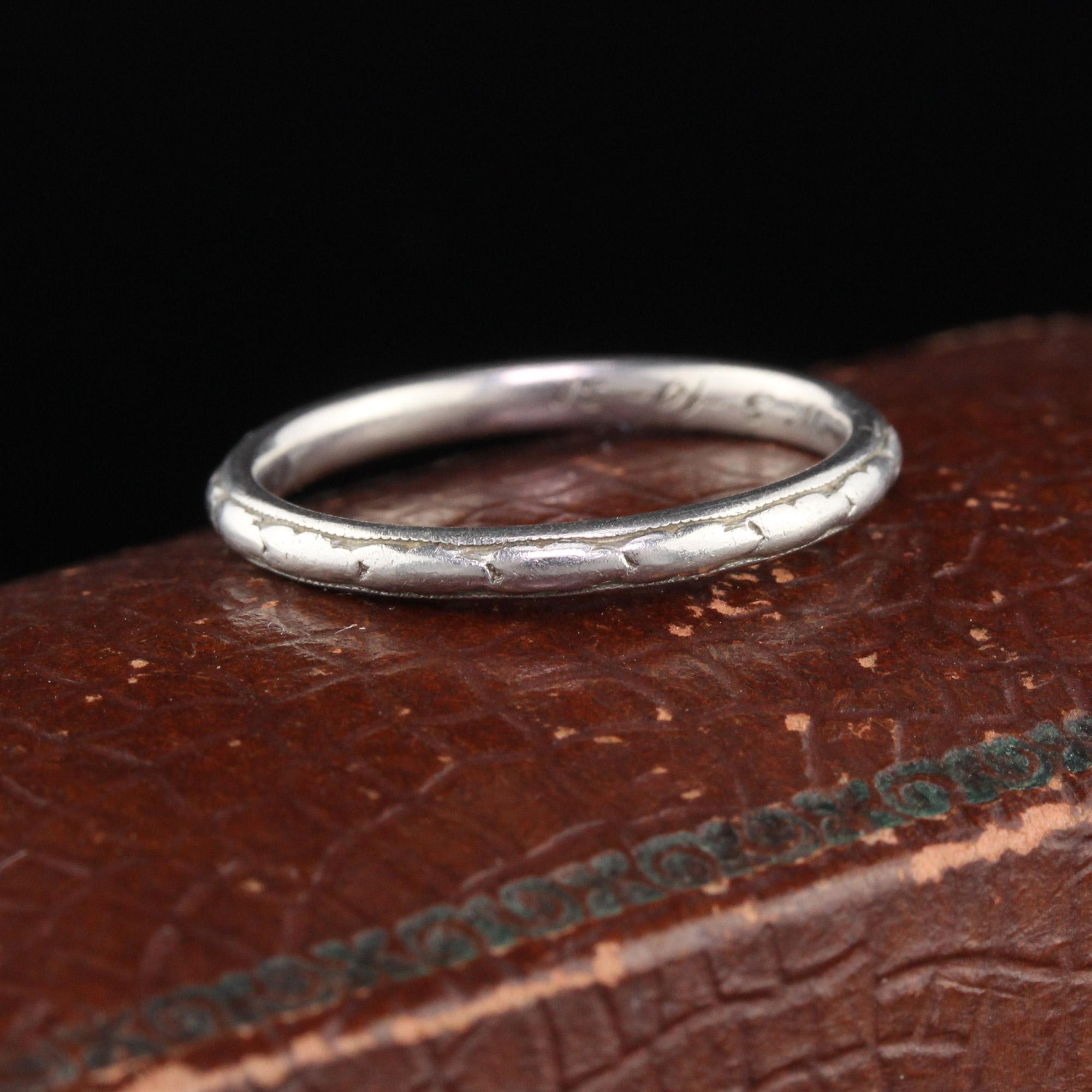 Circa 1930 - Art deco platinum Orange Blossom wedding band engravings all the way around.

#R0212

Metal: Platinum

Weight: 3.3 Grams

Ring Size: 6.5 (sizable)

This ring can be sized for a $30 fee!

*Please note that we cannot accept returns on