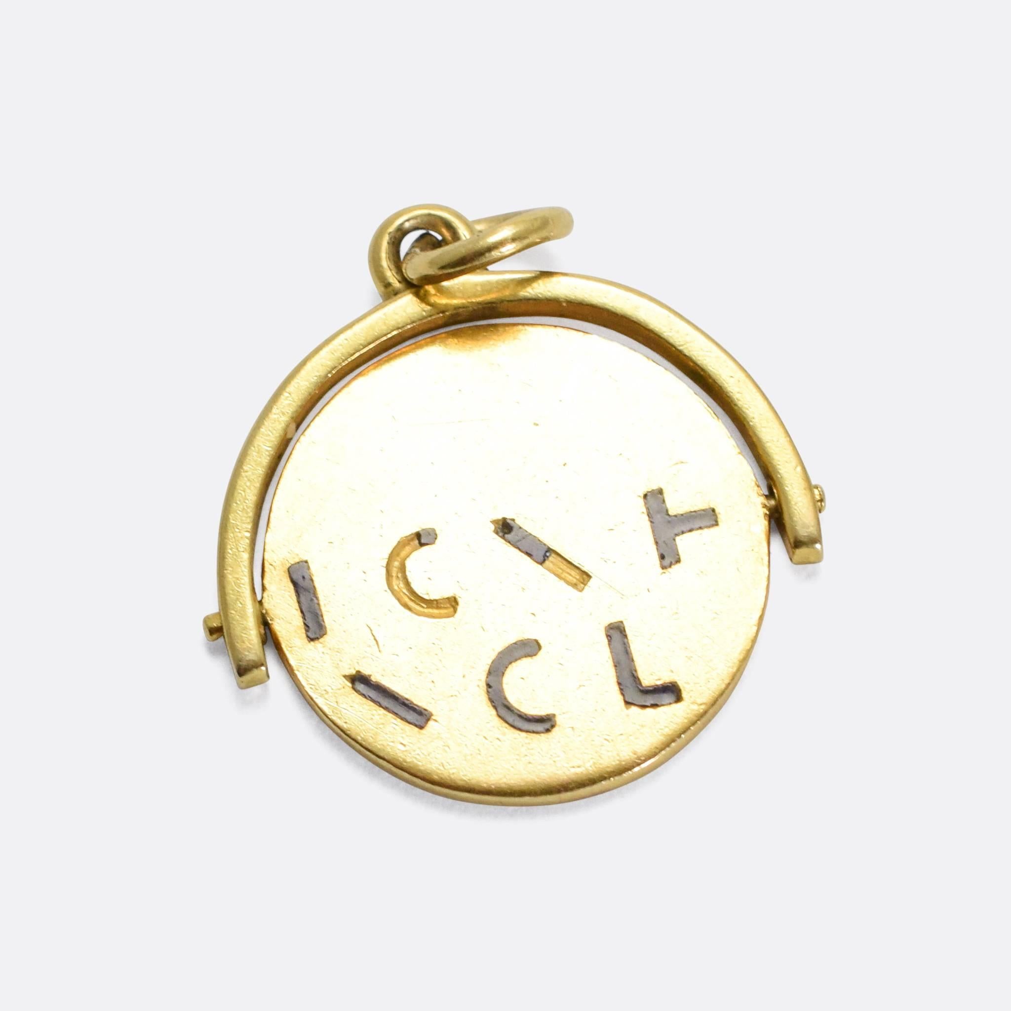A sweet vintage spinner charm pendant. Each face has different letter components, such that when viewed on its own the message is unintelligible. However, when the disk is spun the full message is revealed: 