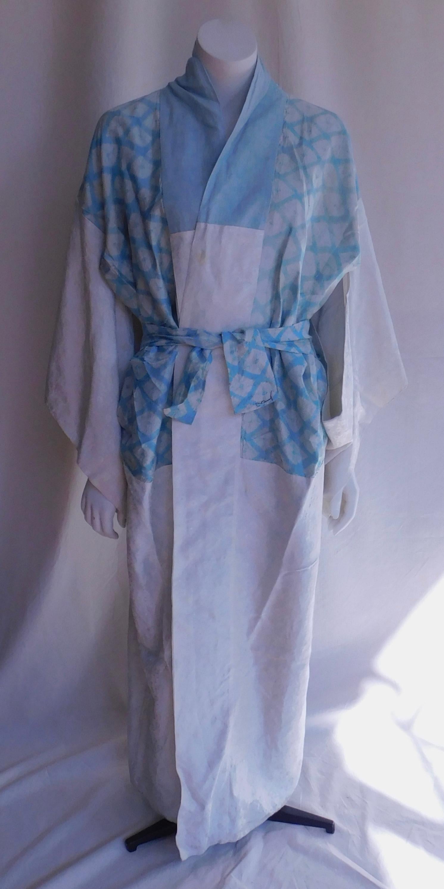 Taisho period Japanese Juban under kimono handmade and dyed using the shibori resist tying technique. The exterior is silk and the lining is handwoven cotton dyed a soft ice blue.