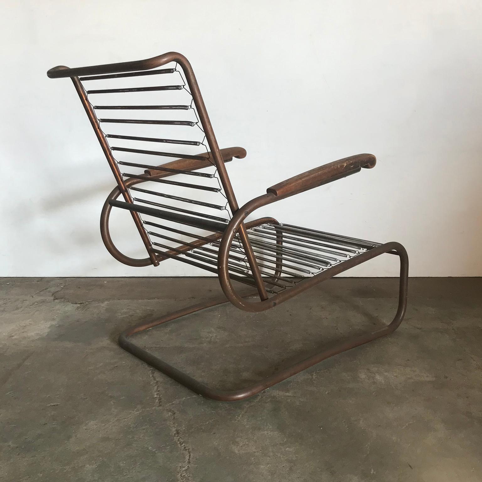 1930, Paul Schuitema for Fana Metaal, Red Copper Chair with Wooden Armrests In Fair Condition For Sale In Amsterdam IJMuiden, NL