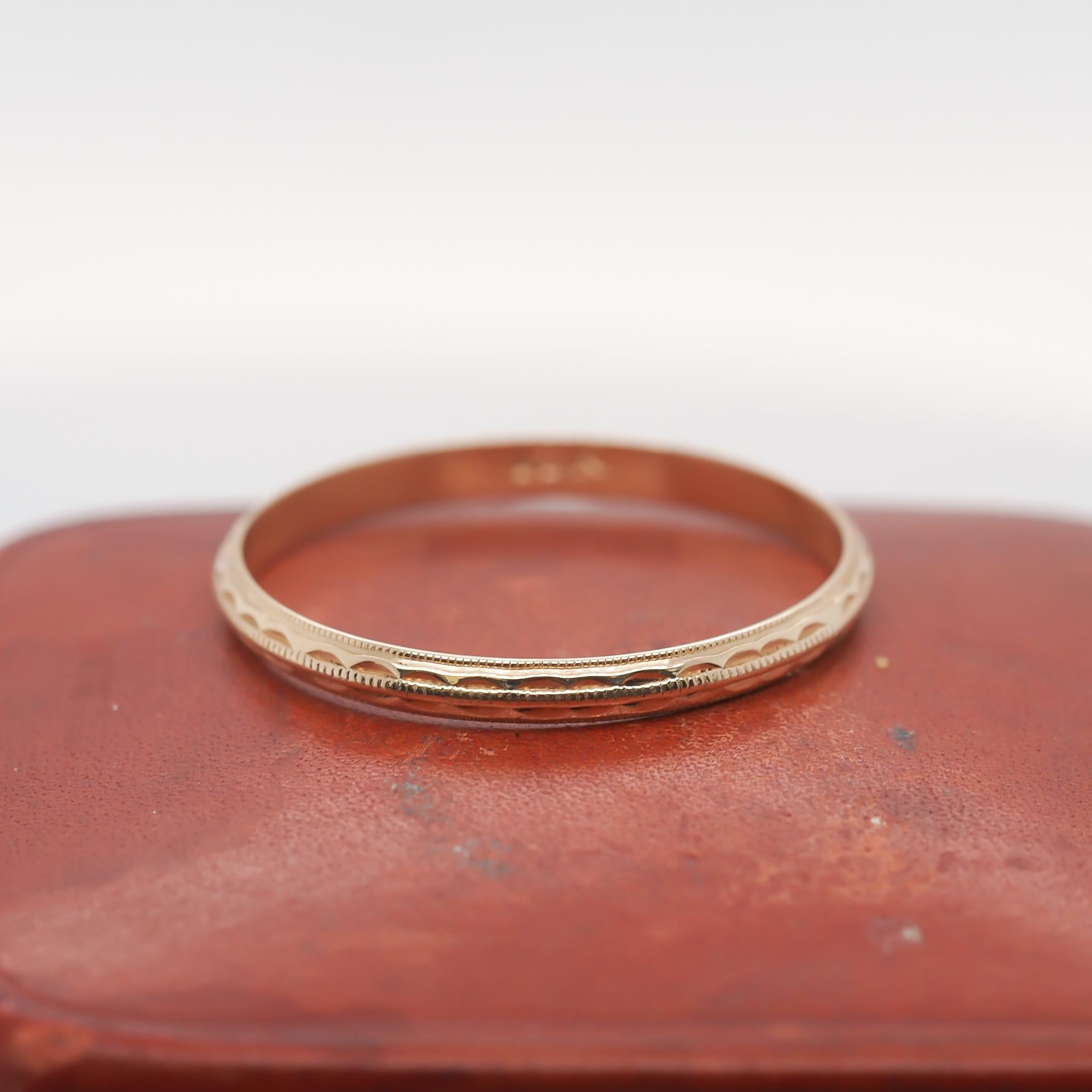 Year: 1930s
Item Details:
Ring Size: 7.5 (Sizable)
Metal Type: 10k yellow gold [Hallmarked, and Tested]
Weight: 1.0 grams
Band Width: 2mm
Condition: Excellent