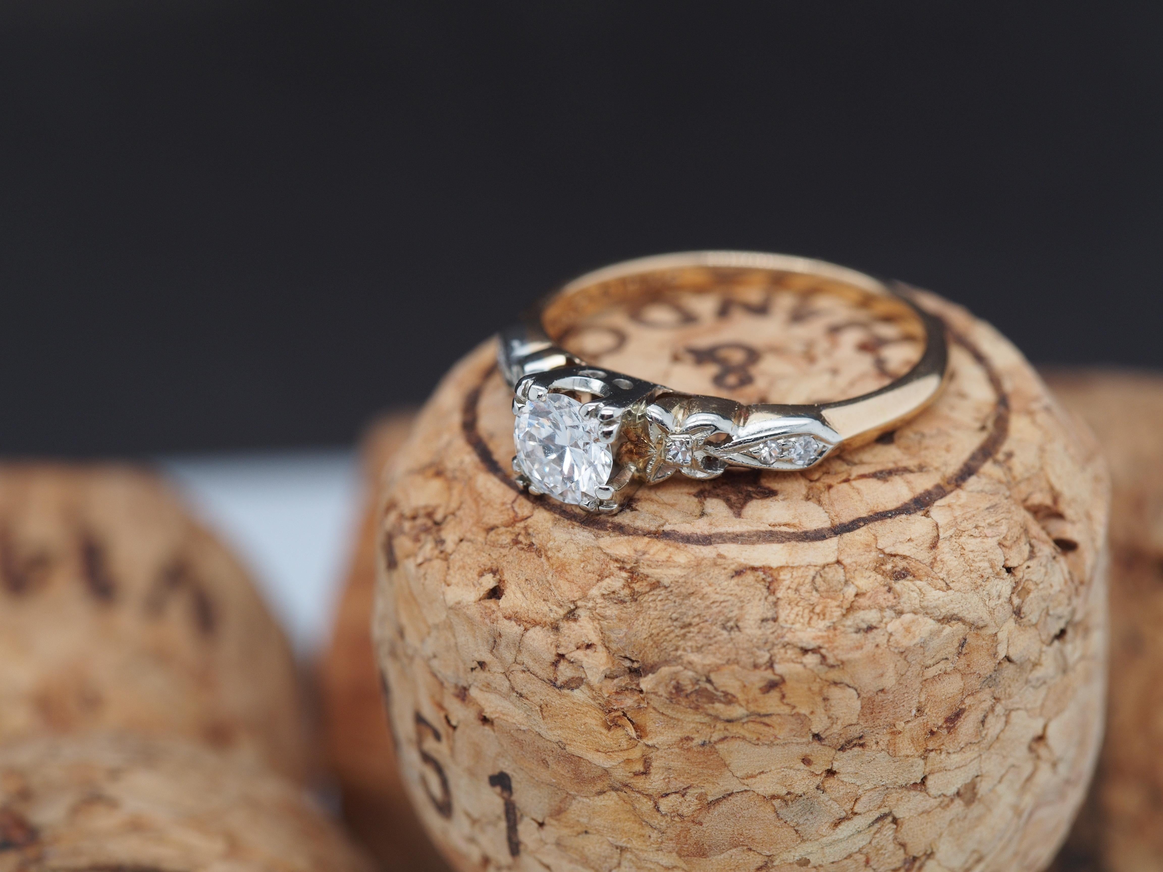 Year: 1930s
Item Details:
Ring Size: 4.75
Metal Type: 14K & 18K Yellow Gold [Hallmarked, and Tested]
Weight: 1.7 grams
Diamond Details
Center Diamond: .40ct, Old European Brilliant, Natural Diamond, F Color, VS Clarity
Side Diamonds: .08ct, total