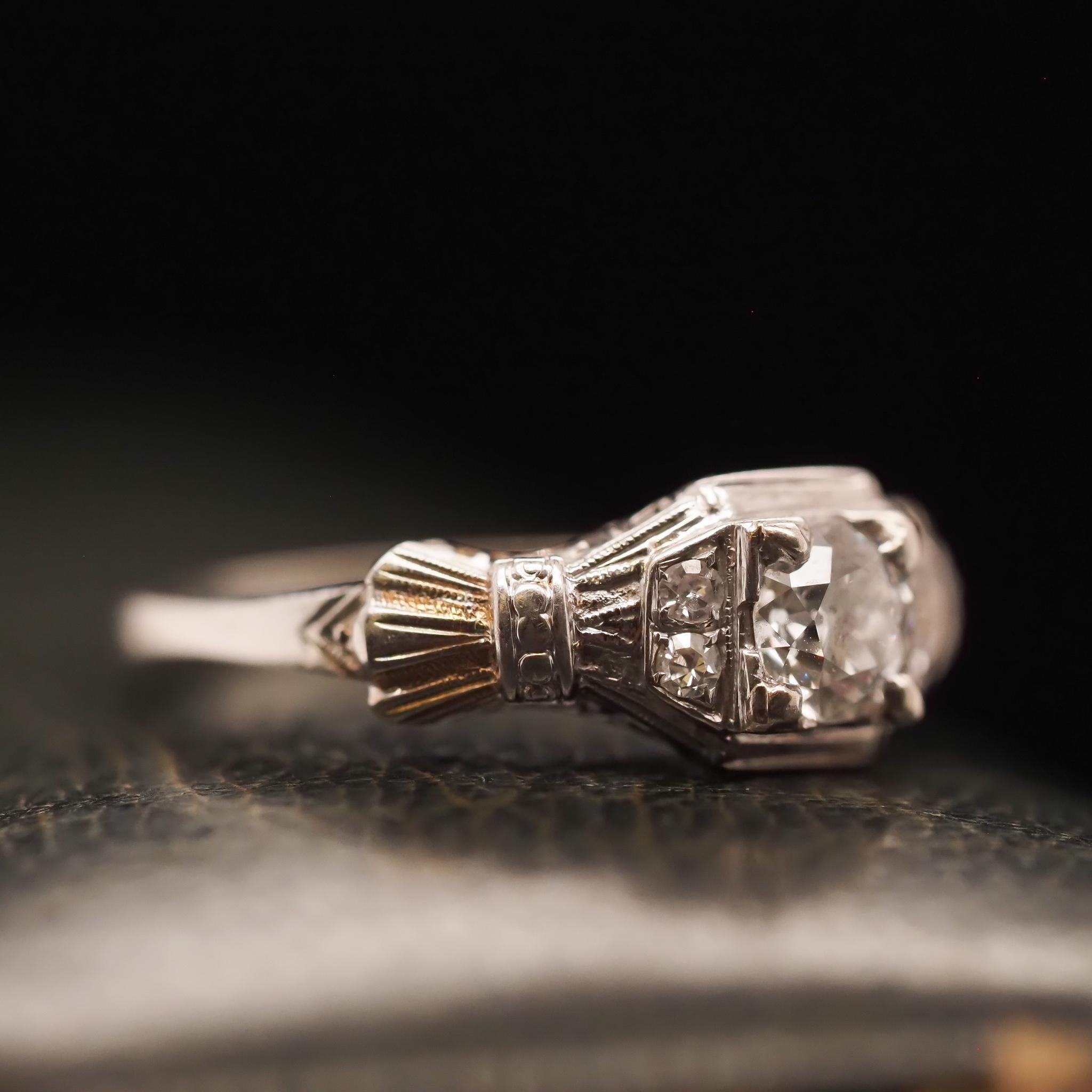 Item Details:
Ring Size: 7 (Sizable)
Metal Type: 14K White Gold [Hallmarked, and Tested]
Weight: 2.8 grams
Diamond Details: .50ct, Old European Brilliant, H color, VS Clarity.
Band Width: 1.70 mm
Condition: Excellent
Art Deco