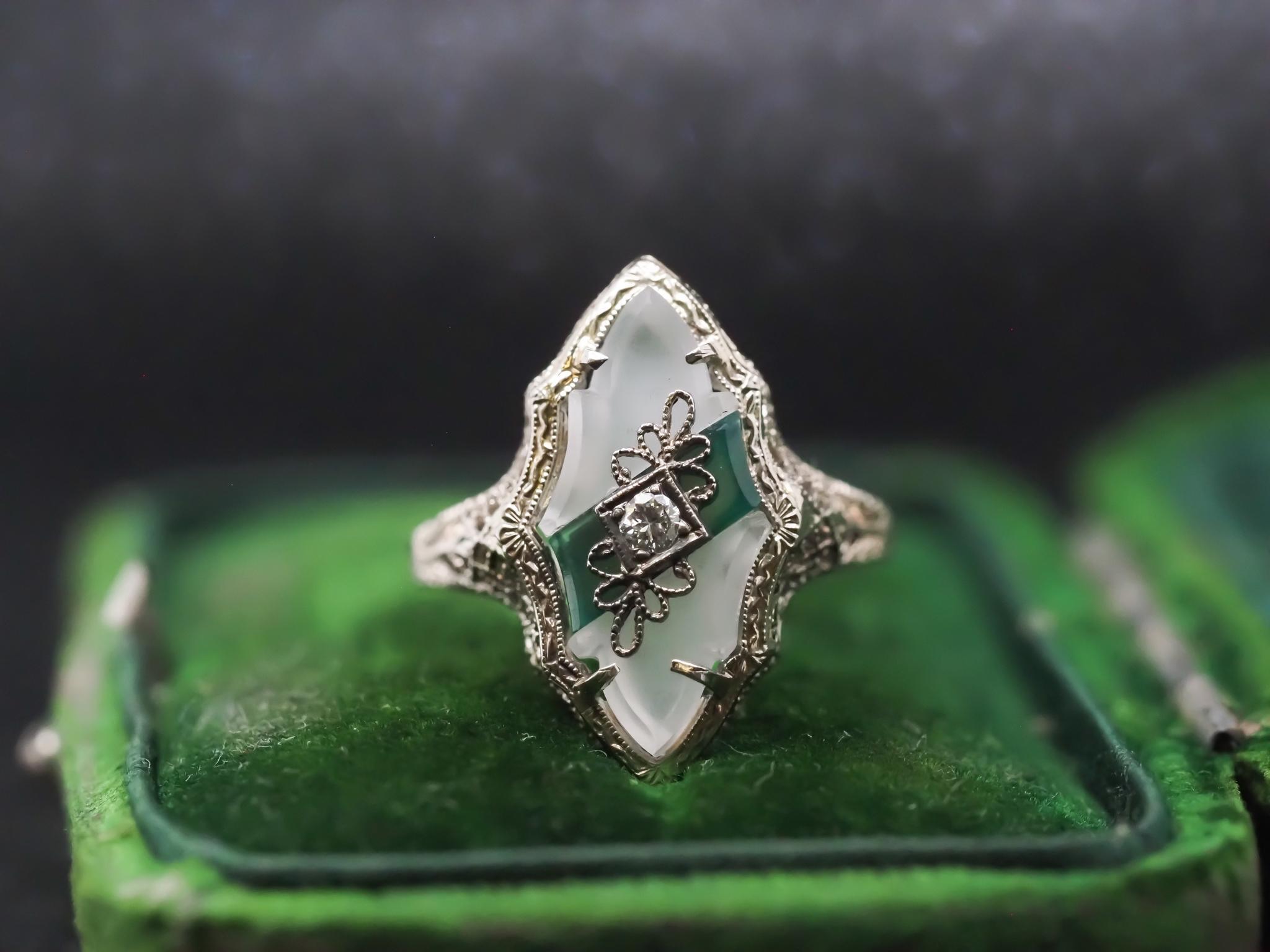 Year: 1930s

Item Details:
Ring Size: 8 (Sizable)
Metal Type: 14K White Gold [Hallmarked, and Tested]
Weight: 2.5 grams

Diamond Details: .05ct, Old European Brilliant, G Color, VS Clarity

Band Width: 1.5mm
Condition: Excellent