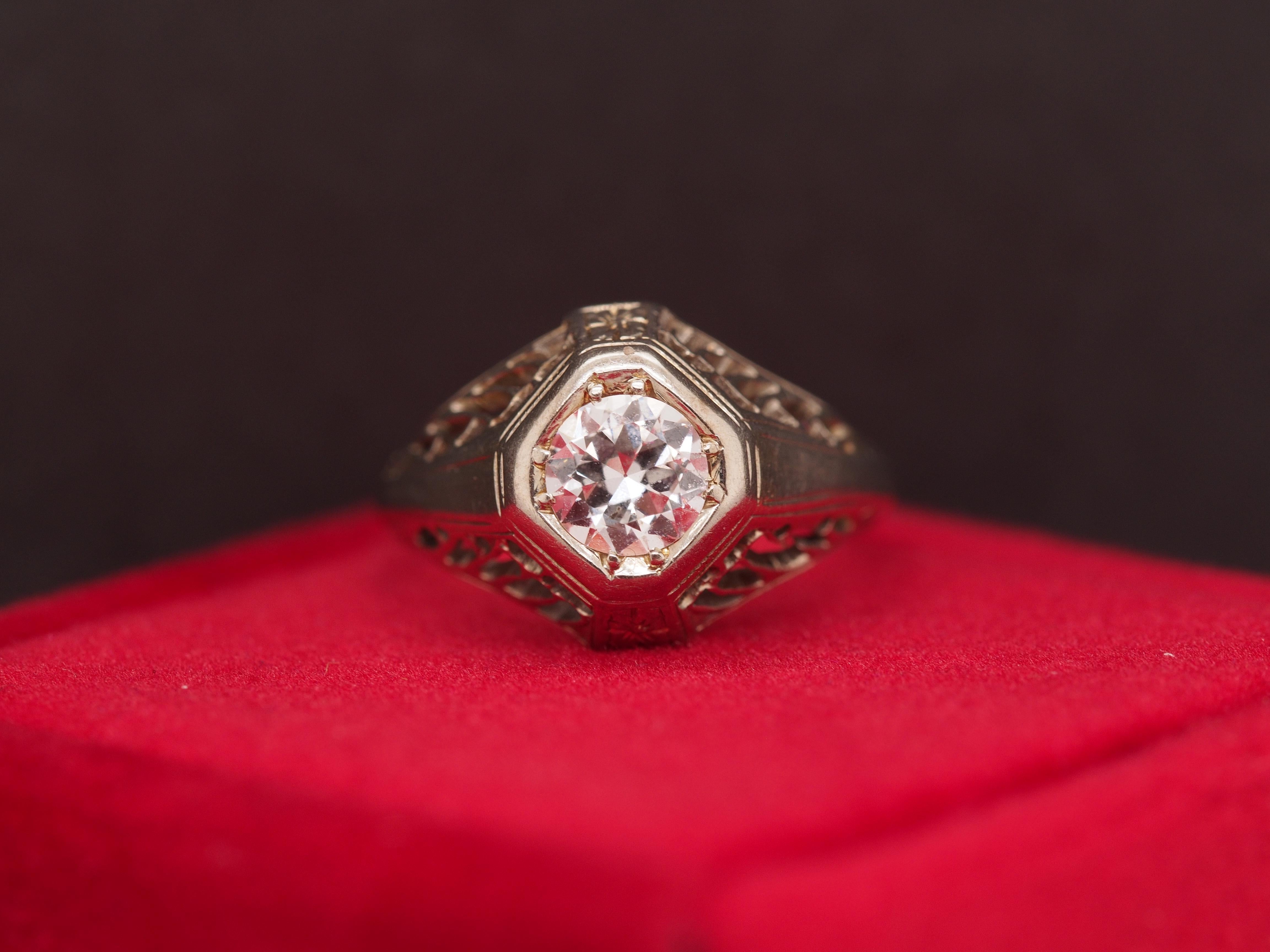 Year: 1930s
Item Details:
Ring Size: 3
Metal Type: 18k white gold [Hallmarked, and Tested]
Weight: 1.9 grams
Diamond Details
Center Diamond: .35ct weight, Old European brilliant shape, F Color, VS Clarity, Natural Diamond.
Band Width: 1.6