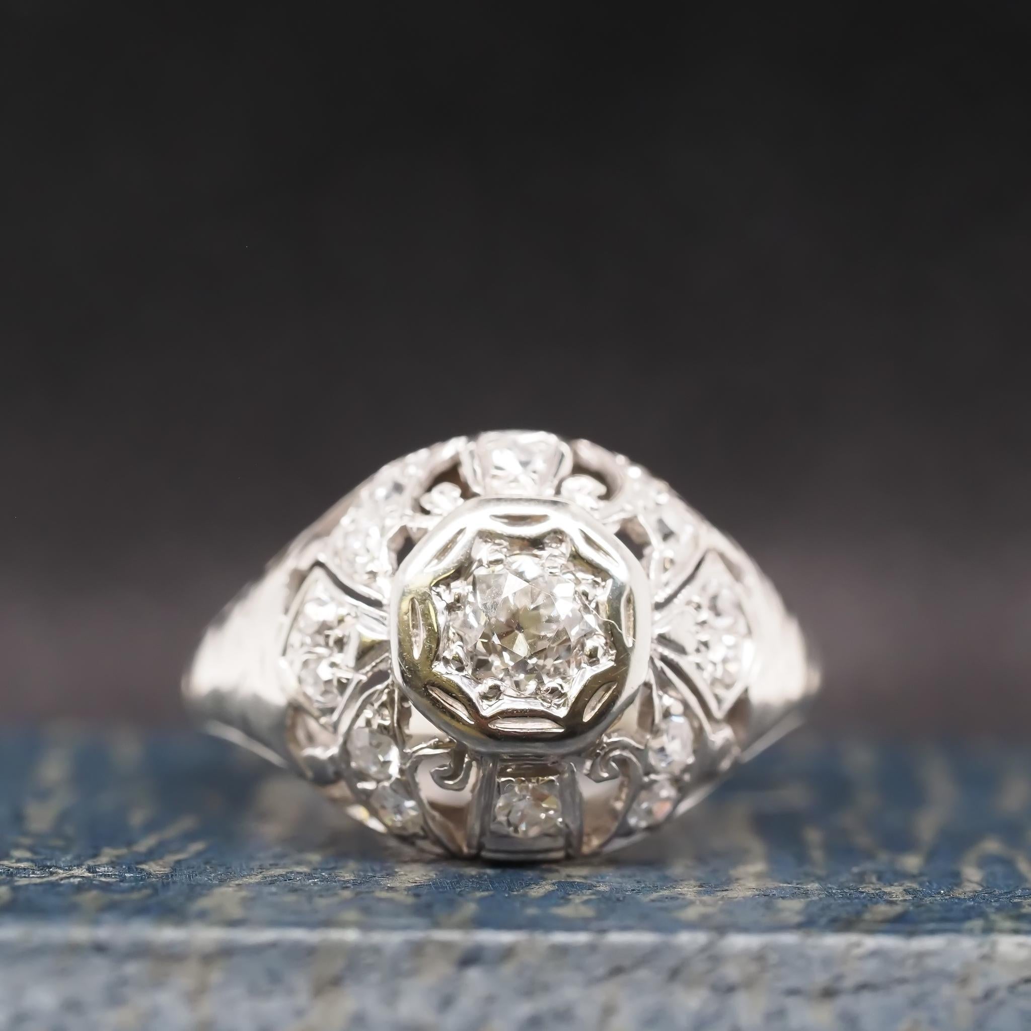 Year: 1930s
Item Details:
Ring Size: 4.5 (Sizable)
Metal Type: 18k White gold [Hallmarked, and Tested]
Weight: 3.3 grams
Diamond Details: .25ct total weight, old European brilliant, F color, VS Clarity.
Band Width: 1.6mm
Condition: Excellent