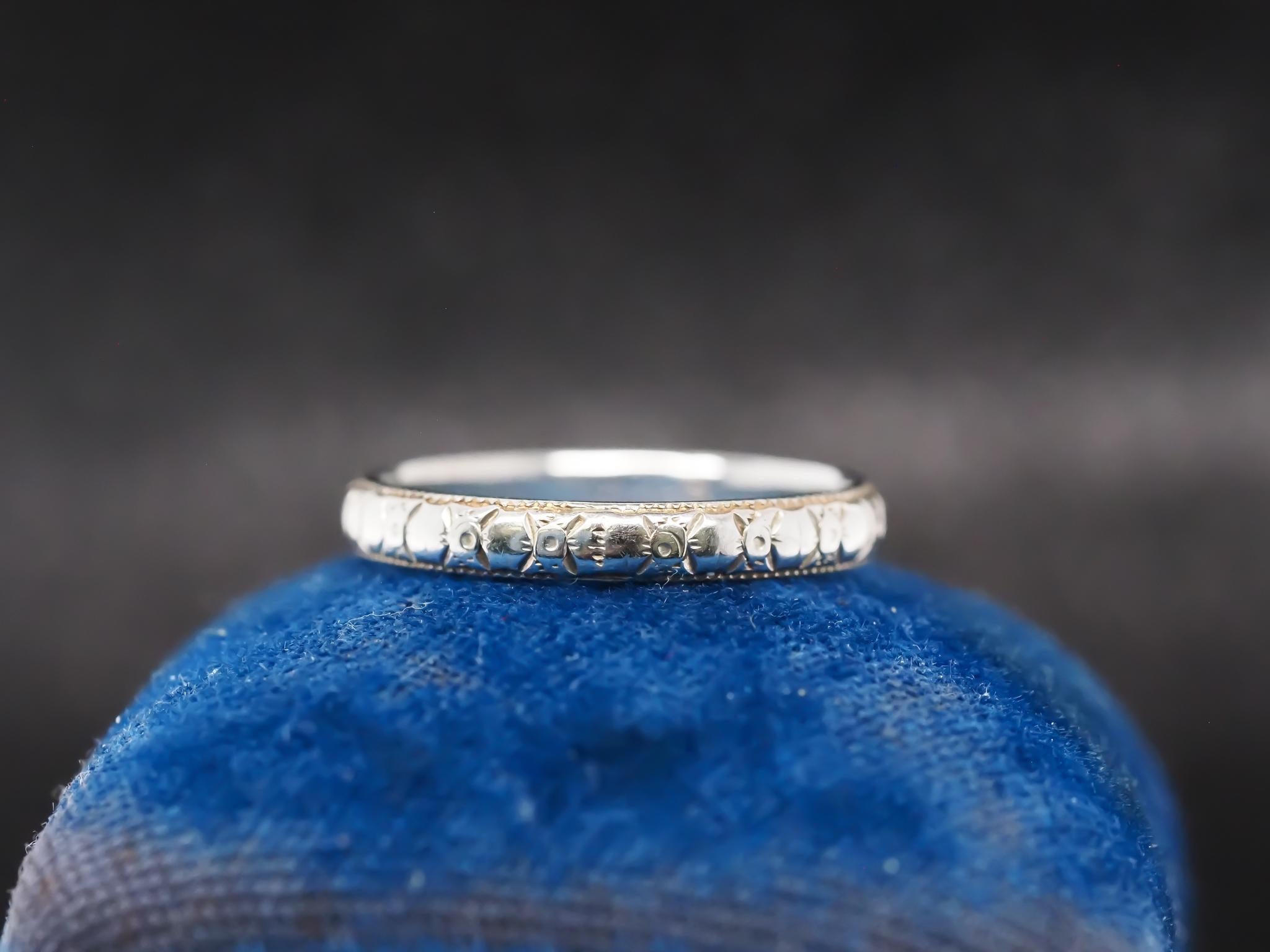 Year: 1930s
Item Details:
Ring Size: Size 6.5
Metal Type: 18K White Gold [Hallmarked, and Tested]
Weight: 2.3 grams
Band Width: 2.4mm
Condition: Excellent