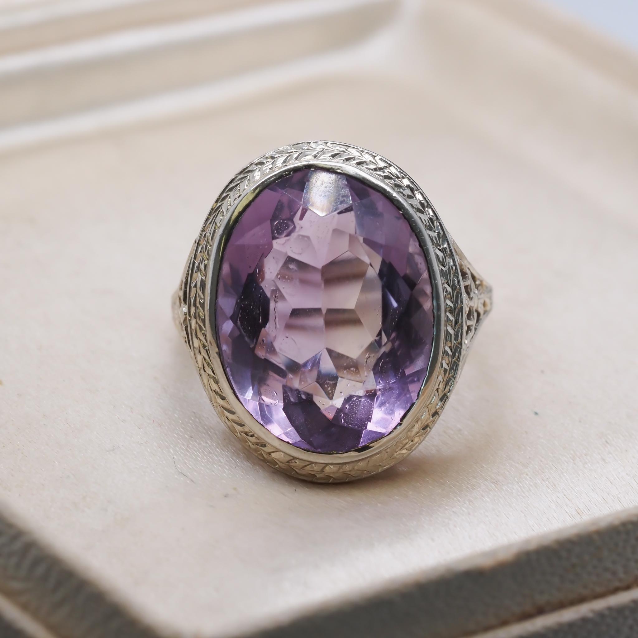 Ring Size: 5
Metal Type: 18K White Gold  [Hallmarked, and Tested]
Weight:  5.0 grams

Details: Oval Shape Amethyst, Natural, 16mm x 12mm

Band Width:  1.5mm
Condition:  Excellent