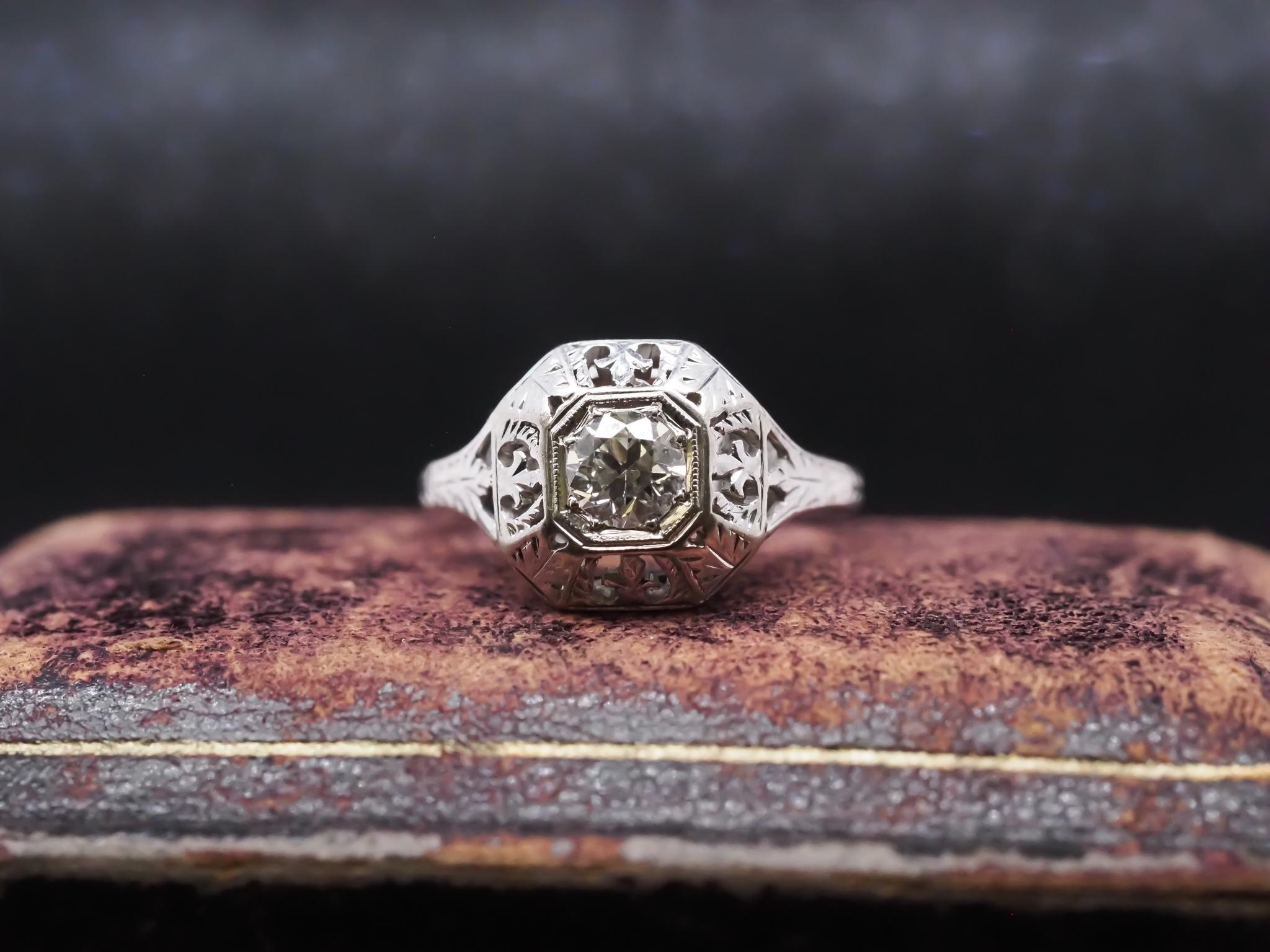 Year: 1930s

Item Details:
Ring Size: 5 (Sizable)
Metal Type: 18k White Gold [Hallmarked, and Tested]
Weight: 3.5 grams

Diamond Details: .45ct, Old European Brilliant, I Color, VS Clarity

Band Width: 1.6mm
Condition: Excellent