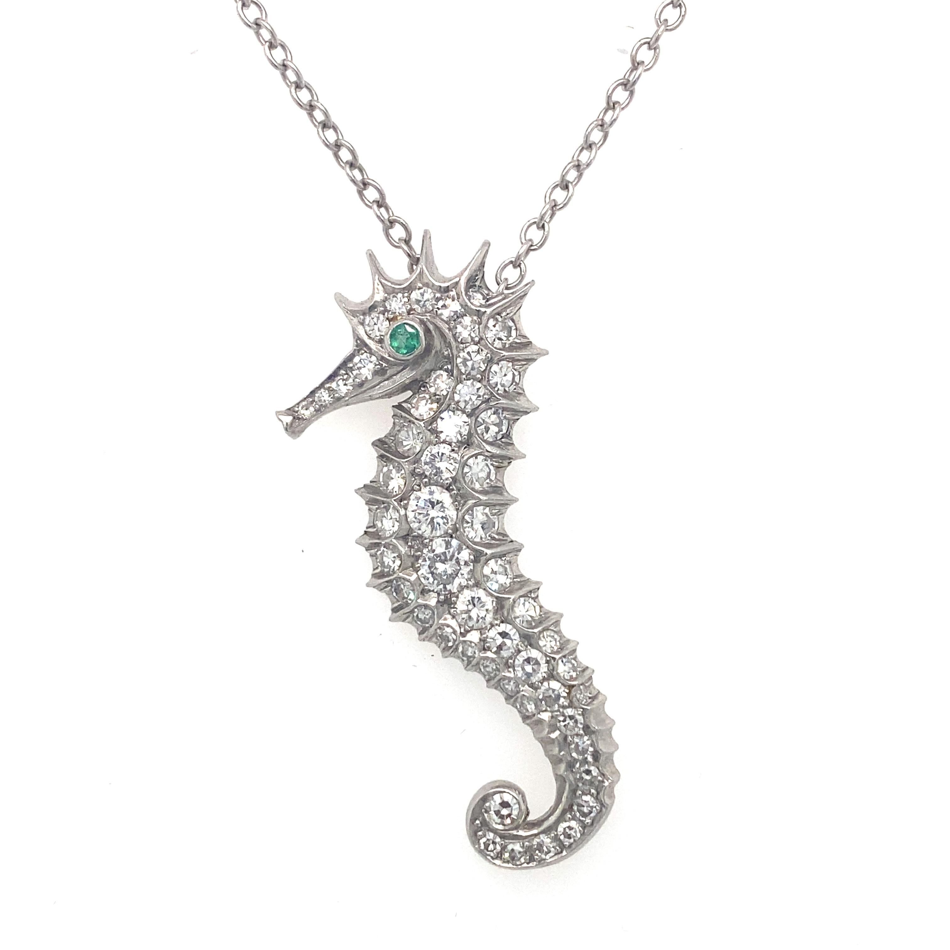 Item Details: This pendant necklace by JE Caldwell features VVS diamonds in a seahorse design with an emerald eye.

Circa: 1930s
Metal Type: Platinum
Weight: 7.5 grams
Size: Pendant is 1.5 inch Height, chain length is 16 inch Length

Diamond