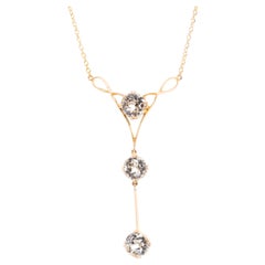 Antique Circa 1930s Art Nouveau Blue Topaz Three Stone Necklet in 15 Carat Yellow Gold