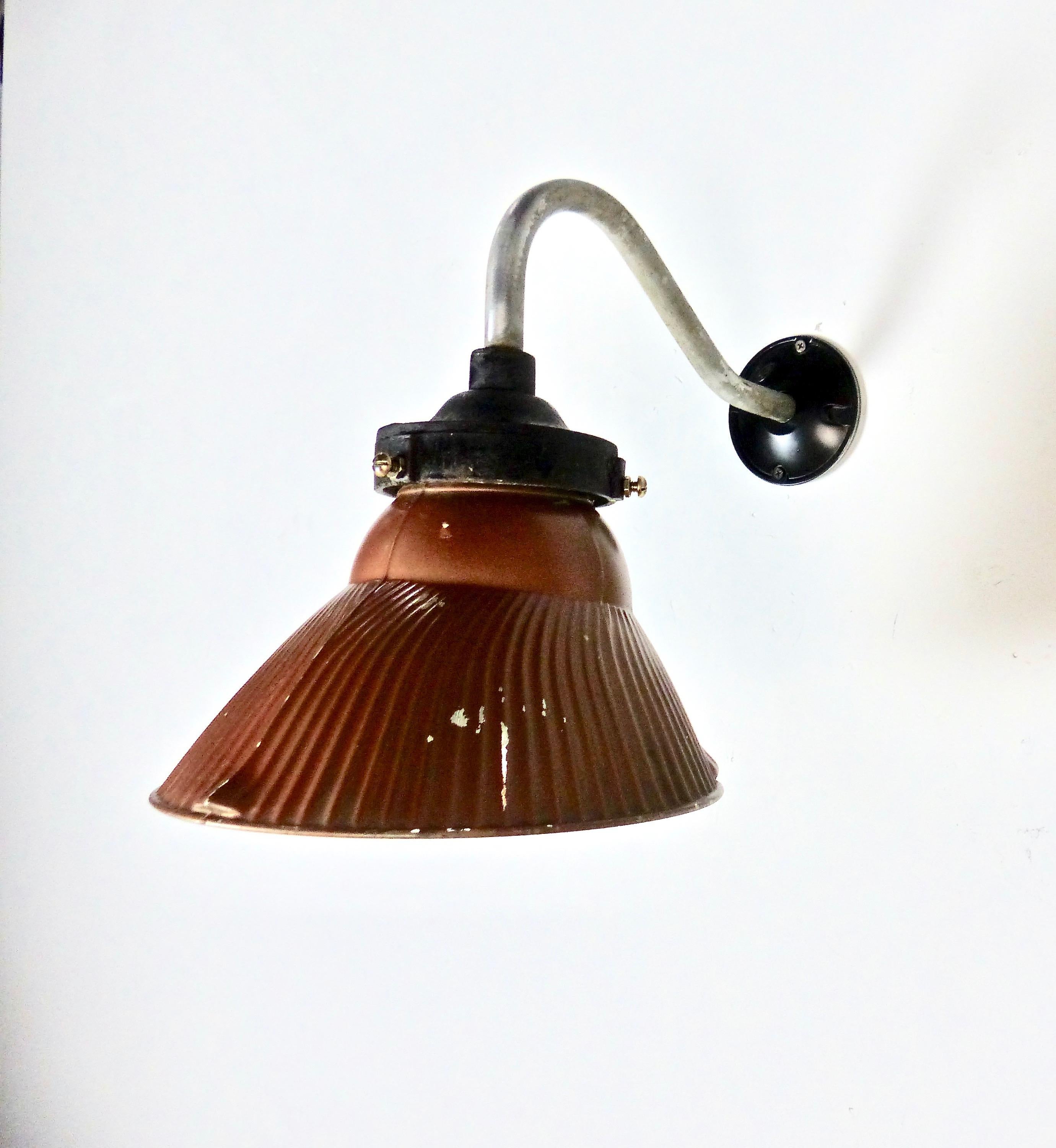 A rare mercury light with a copper painted exterior. Made in England, this circa 1930s wall sconce has the customary silvered interior that gives the light a soft, warm glow. Re-wired and approved to current electrical standards.
Dimensions: 13 H”