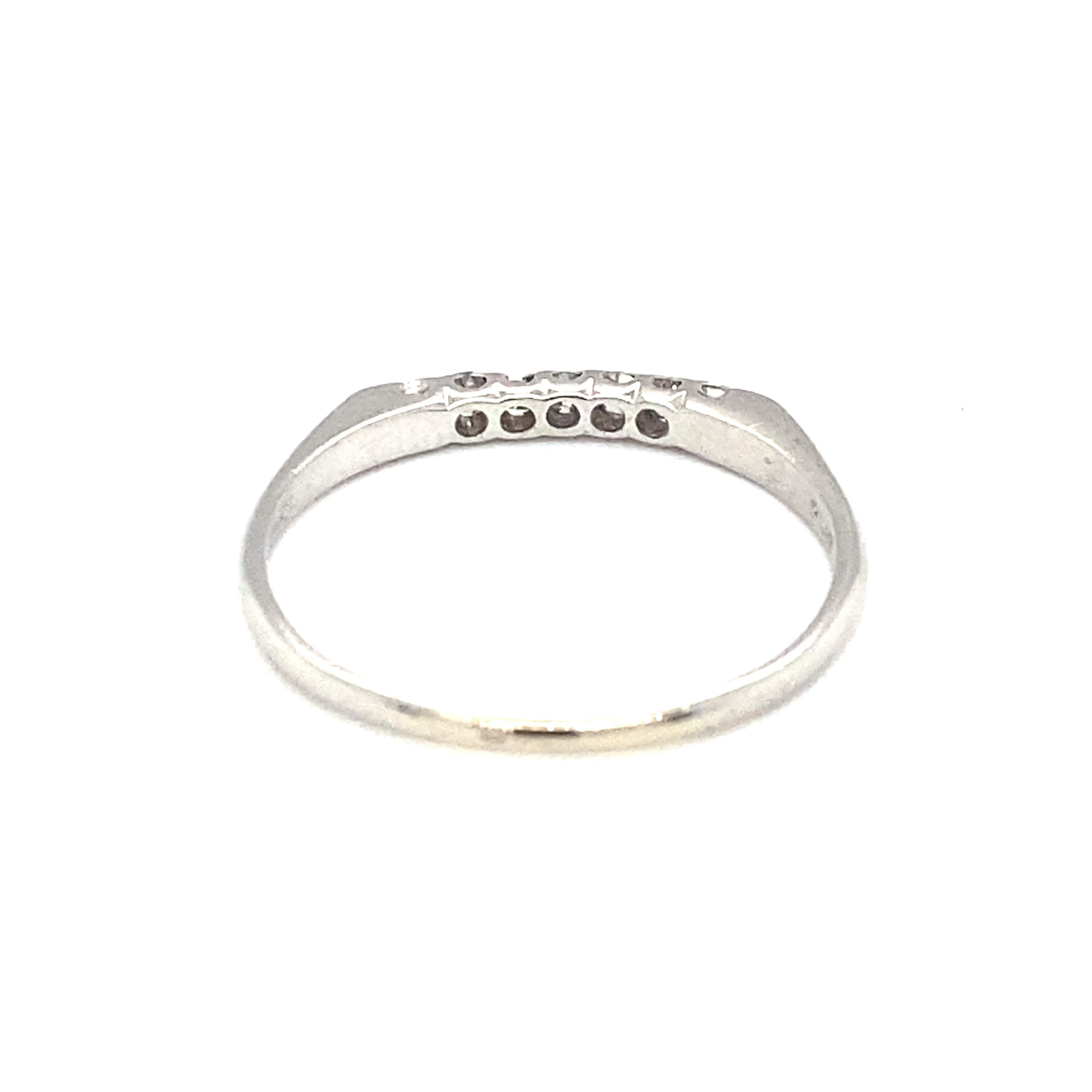 Item Details: This antique anniversary band features single cut diamonds set in platinum on an easily resizable band. It's a timeless diamond ring! 

Circa: 1930s
Metal Type: Platinum
Weight: 2.4 grams
Size: US 9.25, resizable