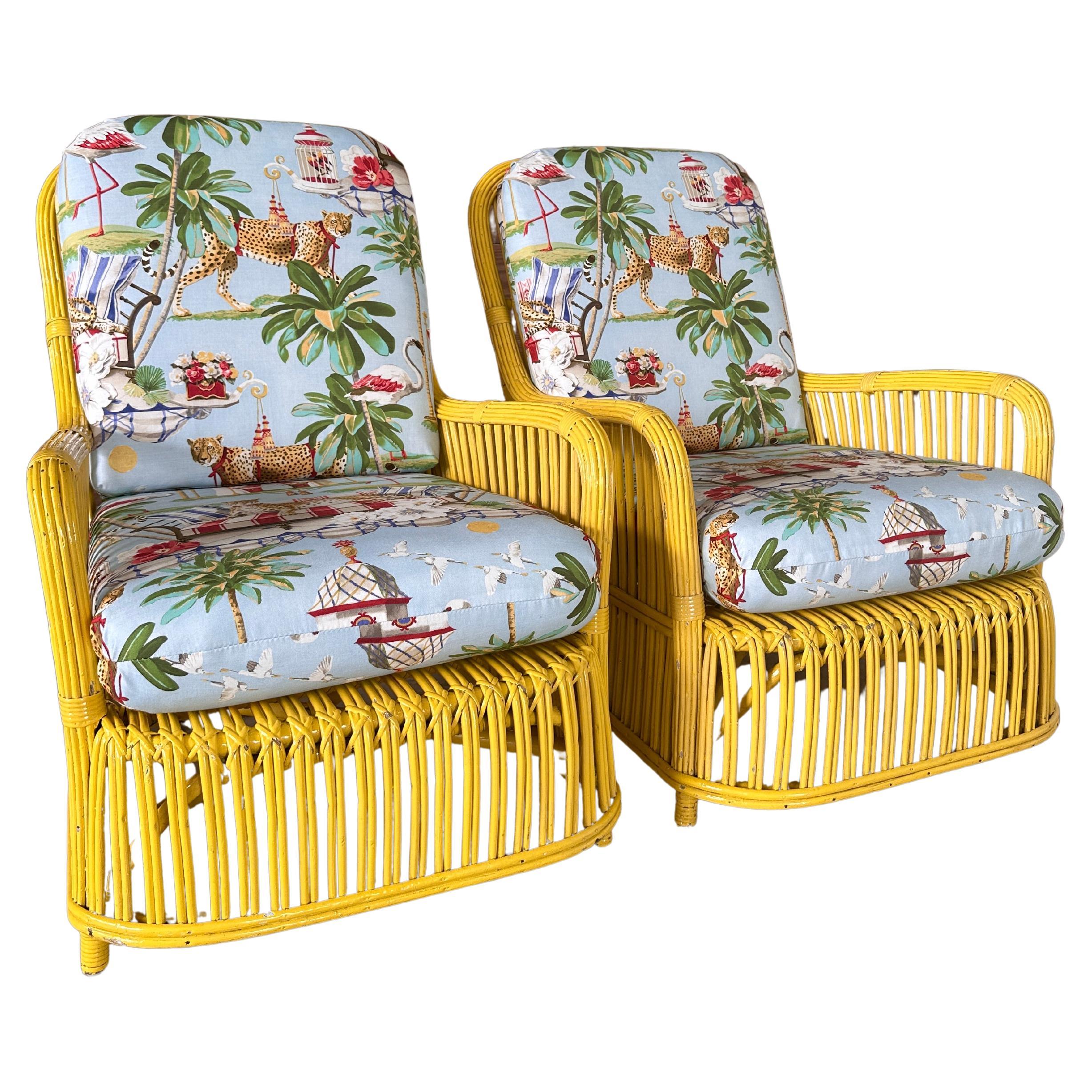 Presenting a vibrant pair of Circa 1930s Stick Rattan Lounge Chairs by the renowned Ficks Reed, showcasing a delightful blend of classic design and Art Deco flair. These sturdy and strong chairs have been lovingly restored and custom upholstered in