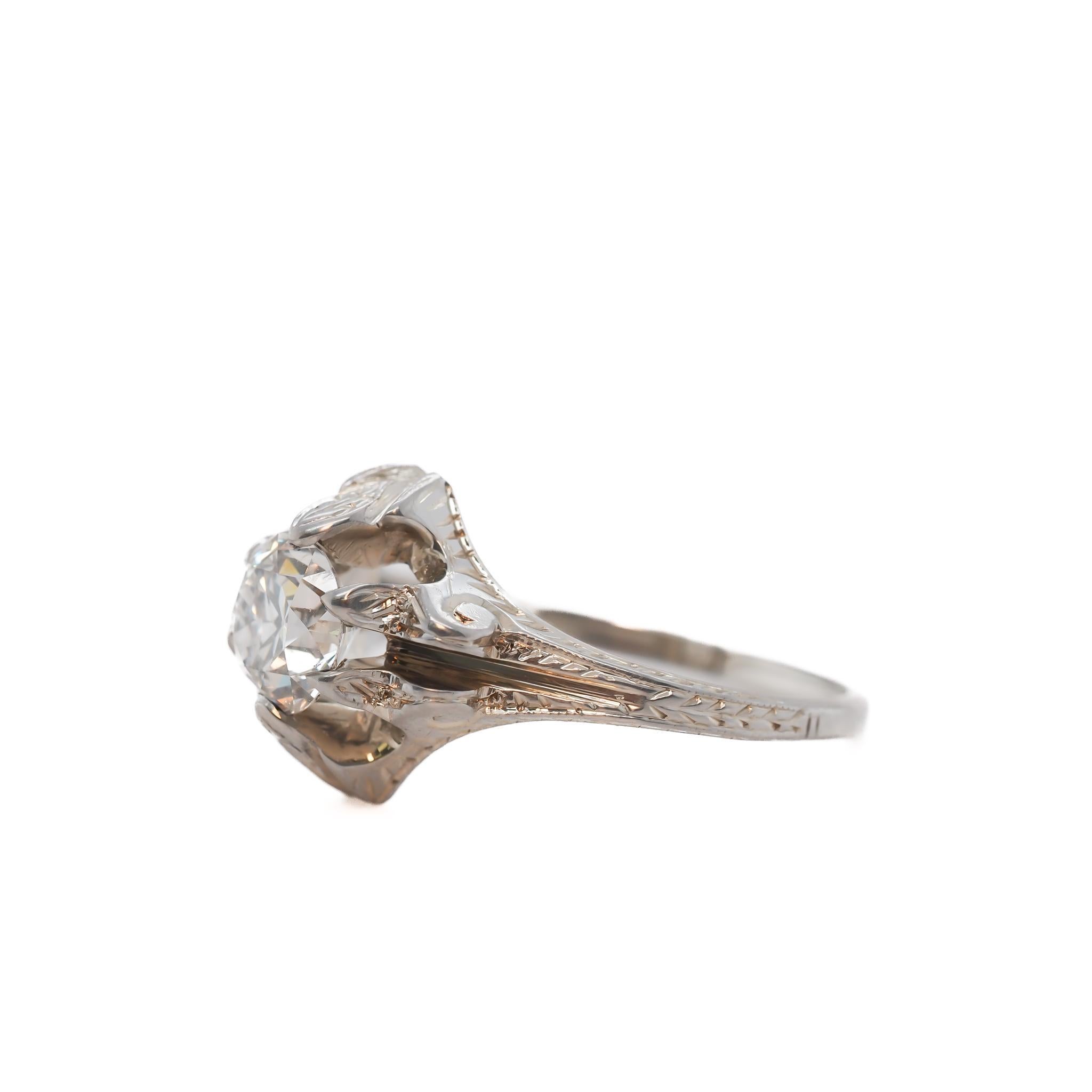 Año: 1930

Detalles del artículo:
Tamaño del anillo: 5.75
Tipo de Metal: Oro blanco de 18 quilates [Hallmarked, and Tested].
Peso: 3.6 gramos

Detalles del diamante central:

Informe GIA#:2235669379
Peso: .89ct peso total
Talla: Viejo brillante