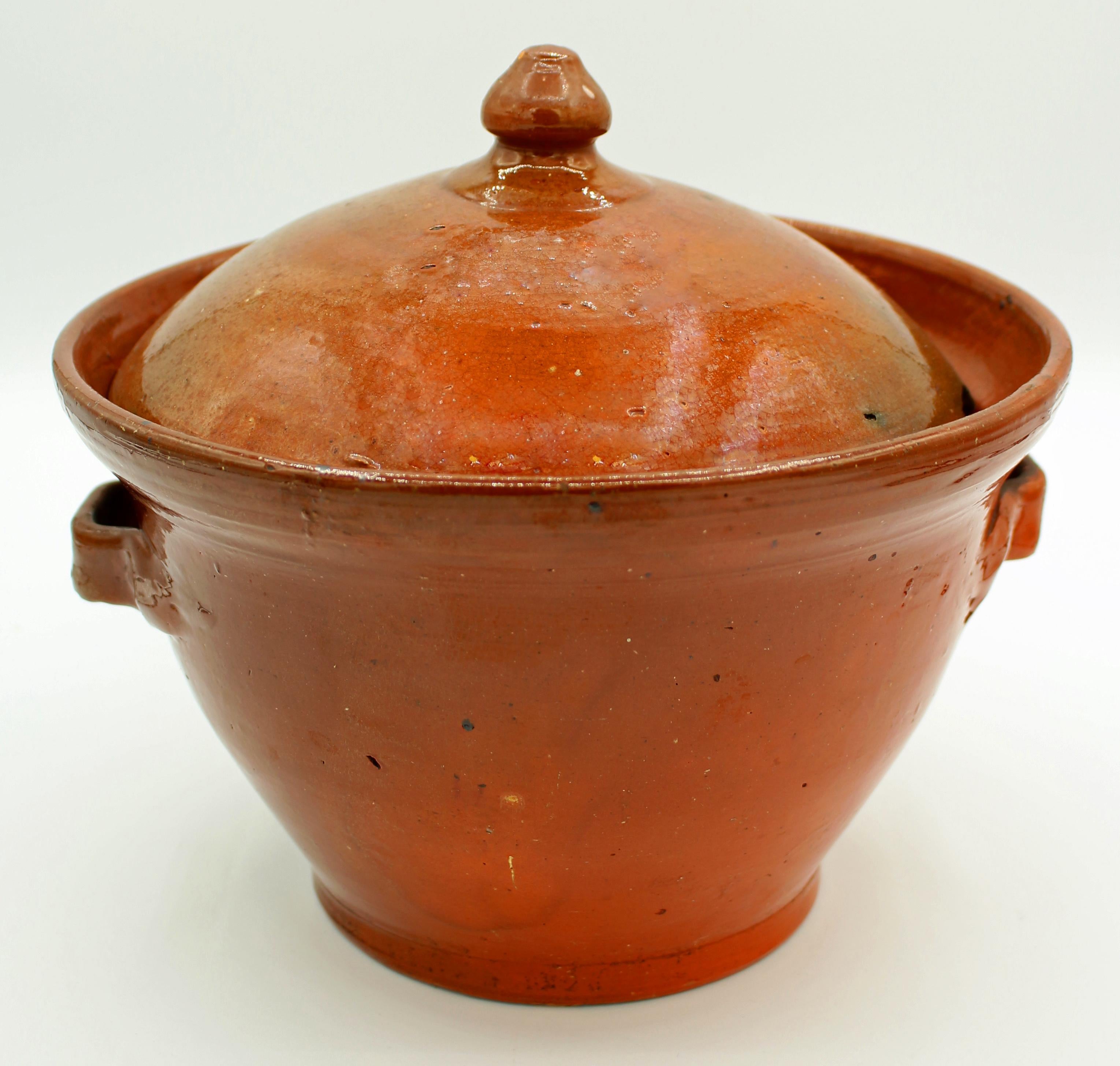 c. 1930s Pottery covered soup tureen in burnt orange glaze by Ben Owen I. The tureen is nearly perfect but the lid has multiple rim losses. 