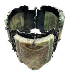 Circa 1930s Mexican Sterling Silver and Green Onyx Mask Bracelet