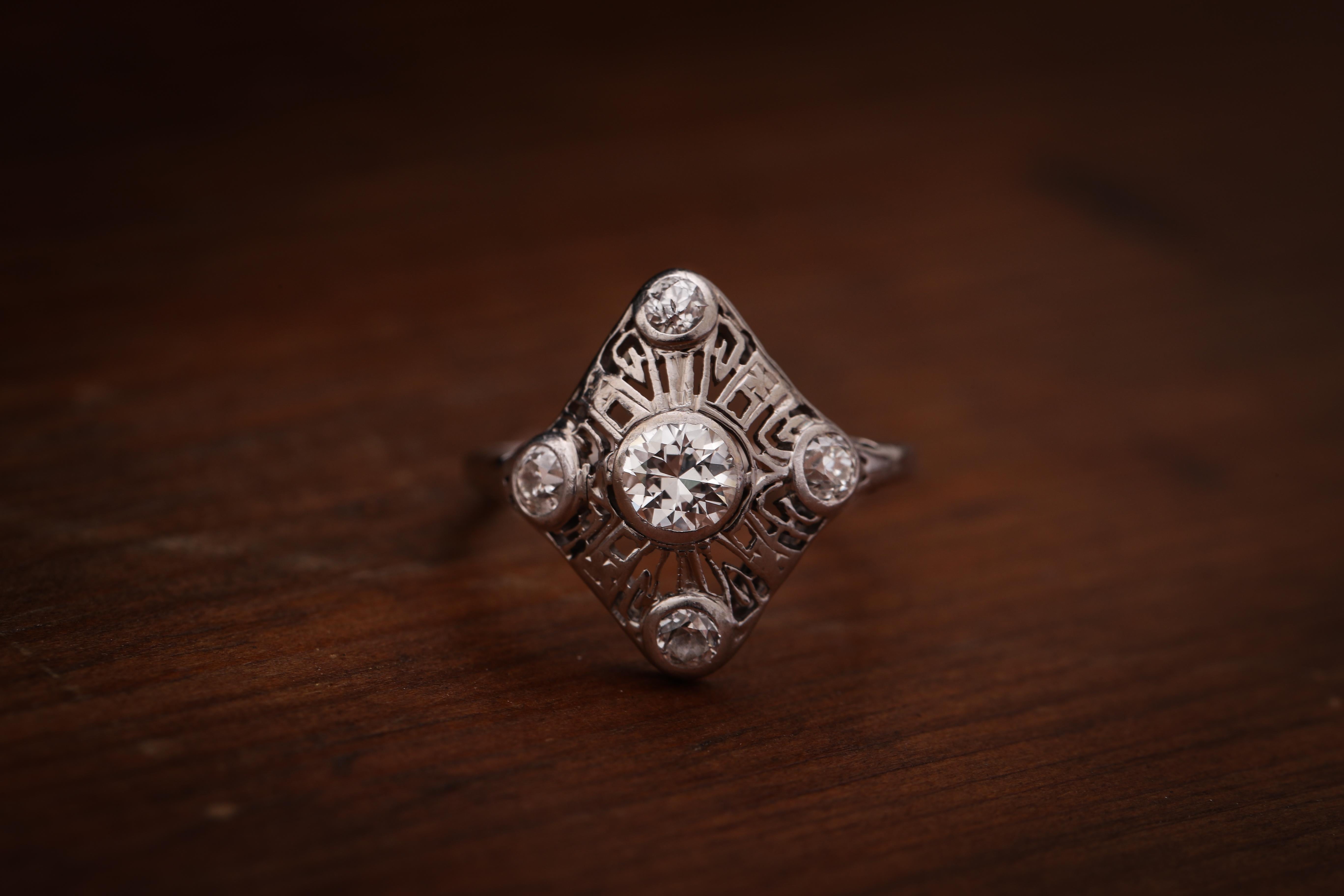 Old European Cut Art Deco White Gold Old European Diamond Filigree Shield Ring, circa 1930s