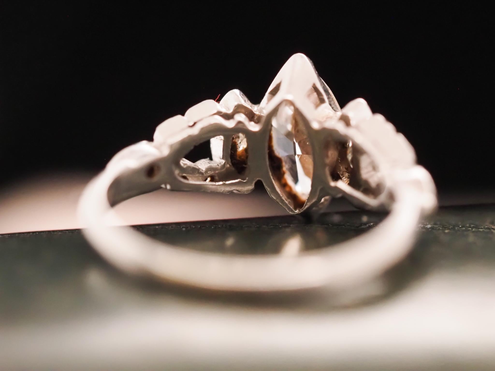Circa 1930s Platinum Art Deco Antique Marquise Engagement Ring In Good Condition For Sale In Atlanta, GA