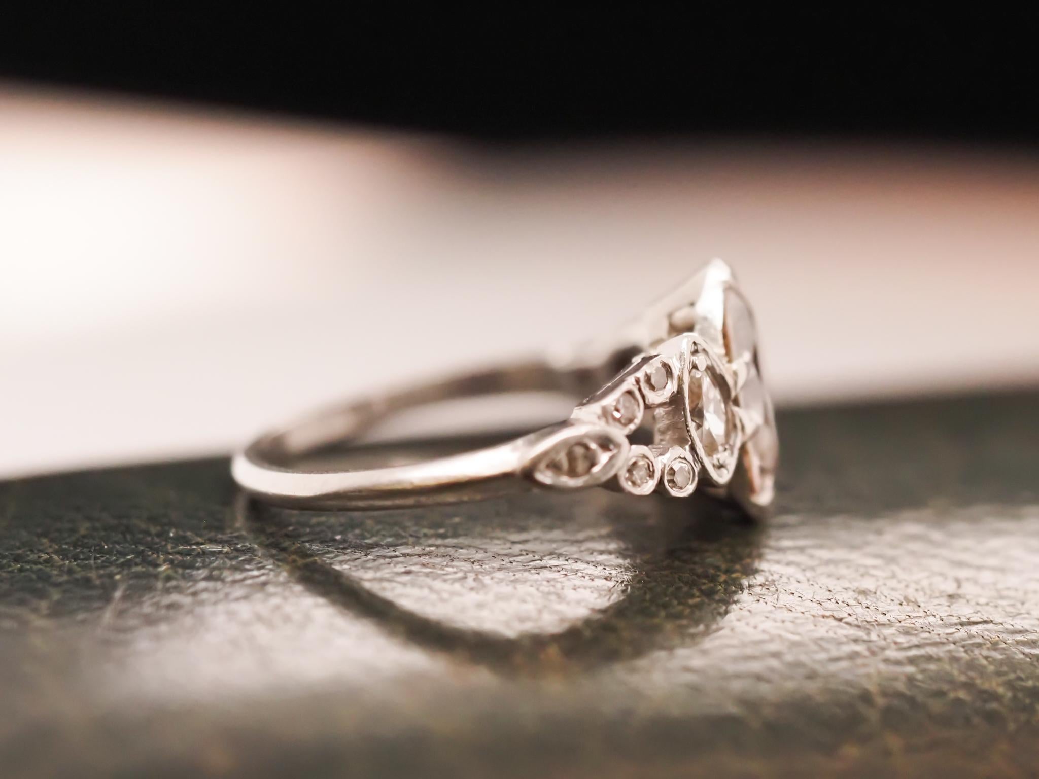 Women's Circa 1930s Platinum Art Deco Antique Marquise Engagement Ring For Sale