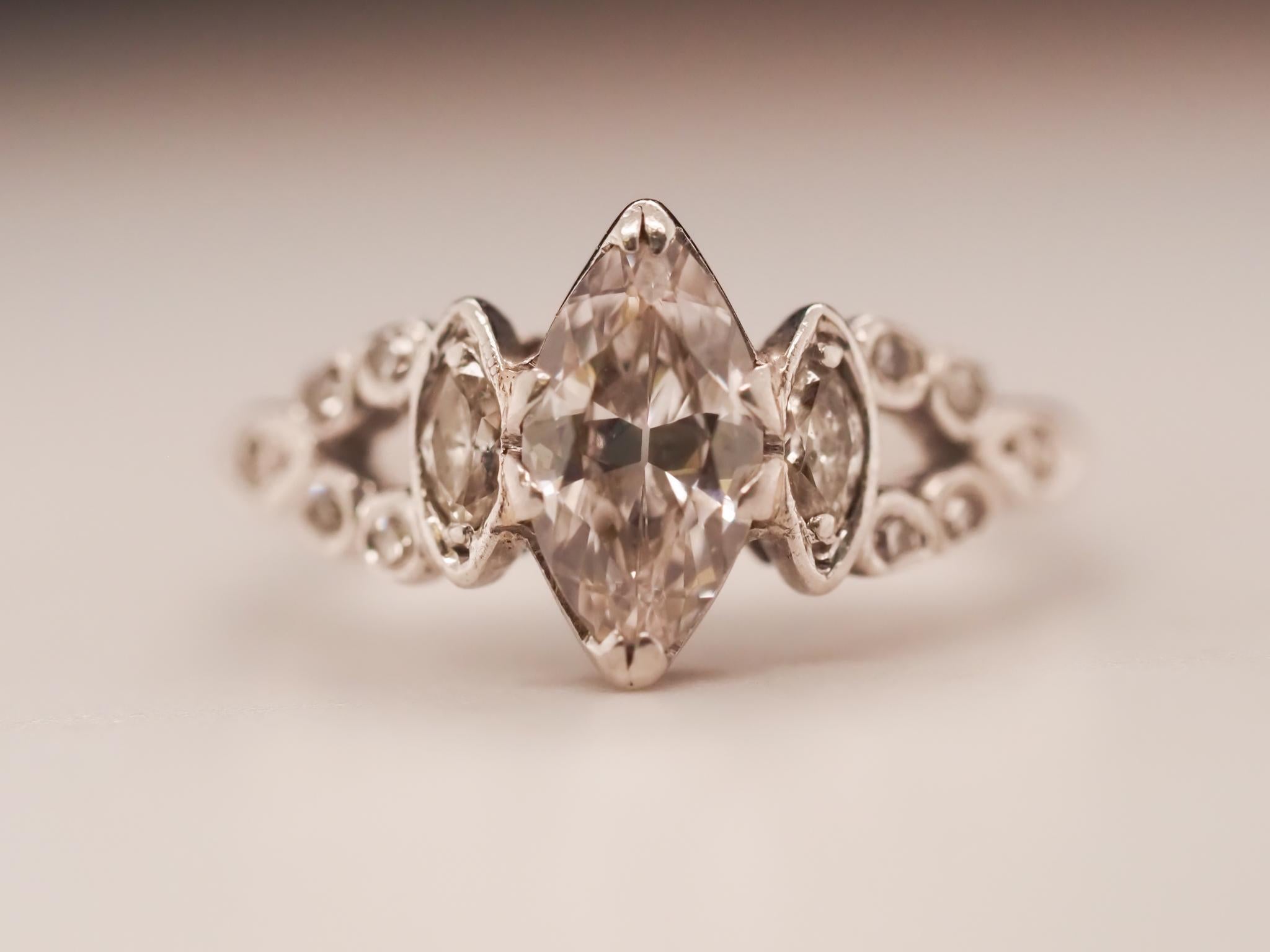 Circa 1930s Platinum Art Deco Antique Marquise Engagement Ring For Sale