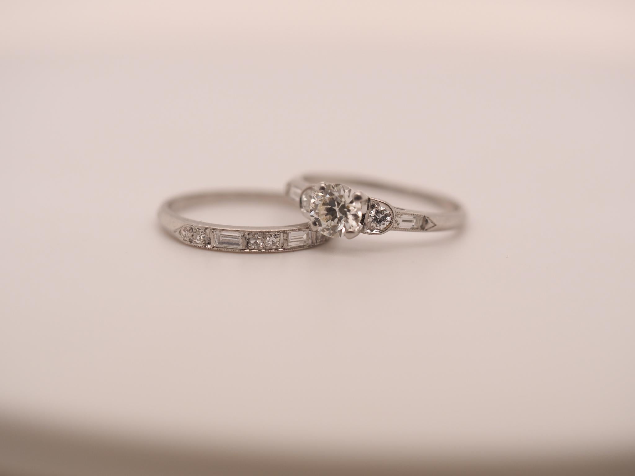 Year: 1930s
Item Details:
Ring Size: 5 (Sizable) - Both rings are size 5
Metal Type: Platinum [Hallmarked, and Tested]
Weight: 4.1 grams
Center Diamond Details: .55ct center diamond in engagement ring, G color, VS Clarity, Old European