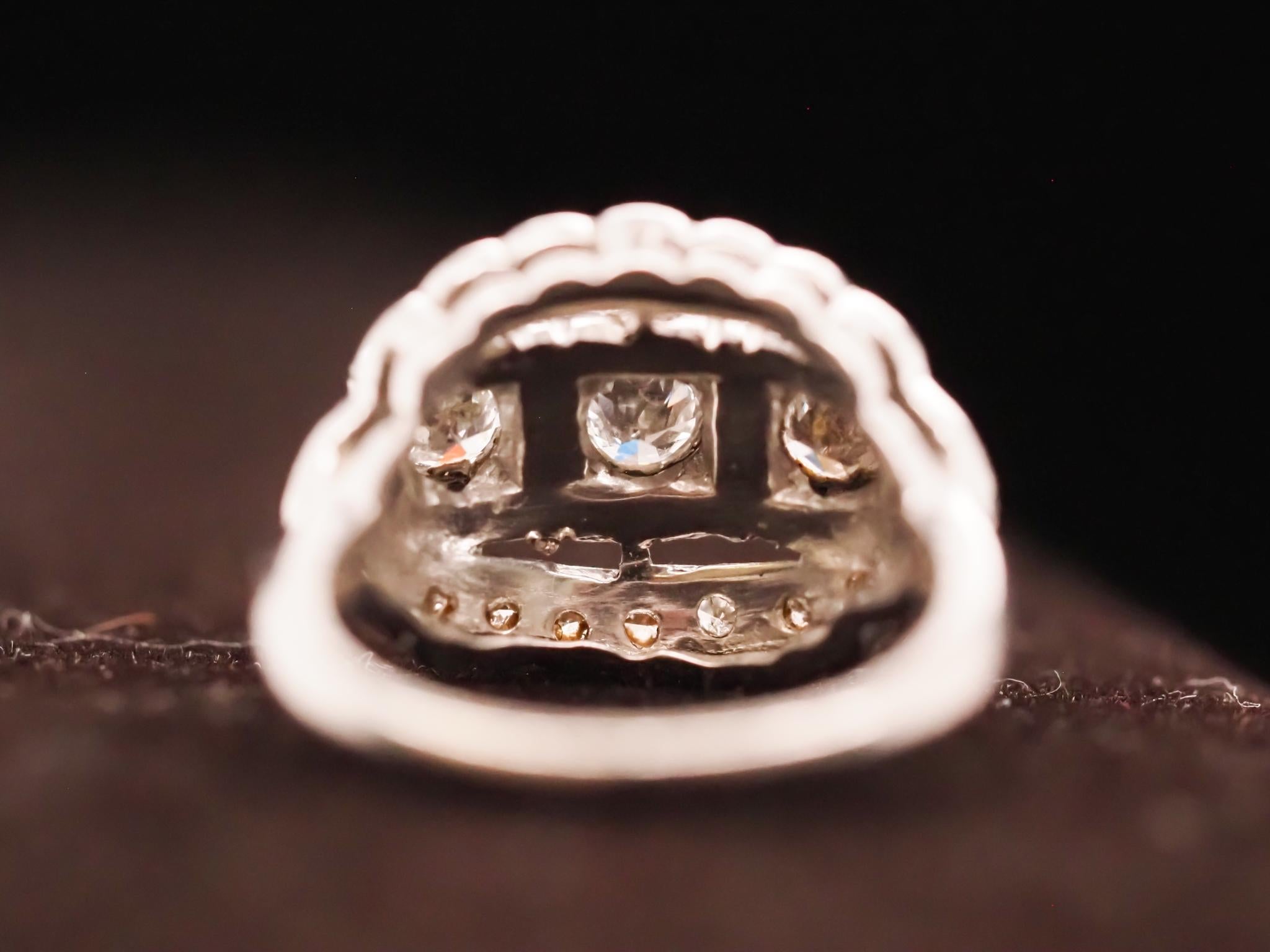 Circa 1930s Platinum Art Deco Three Stone Old European Diamond Ring For Sale 2