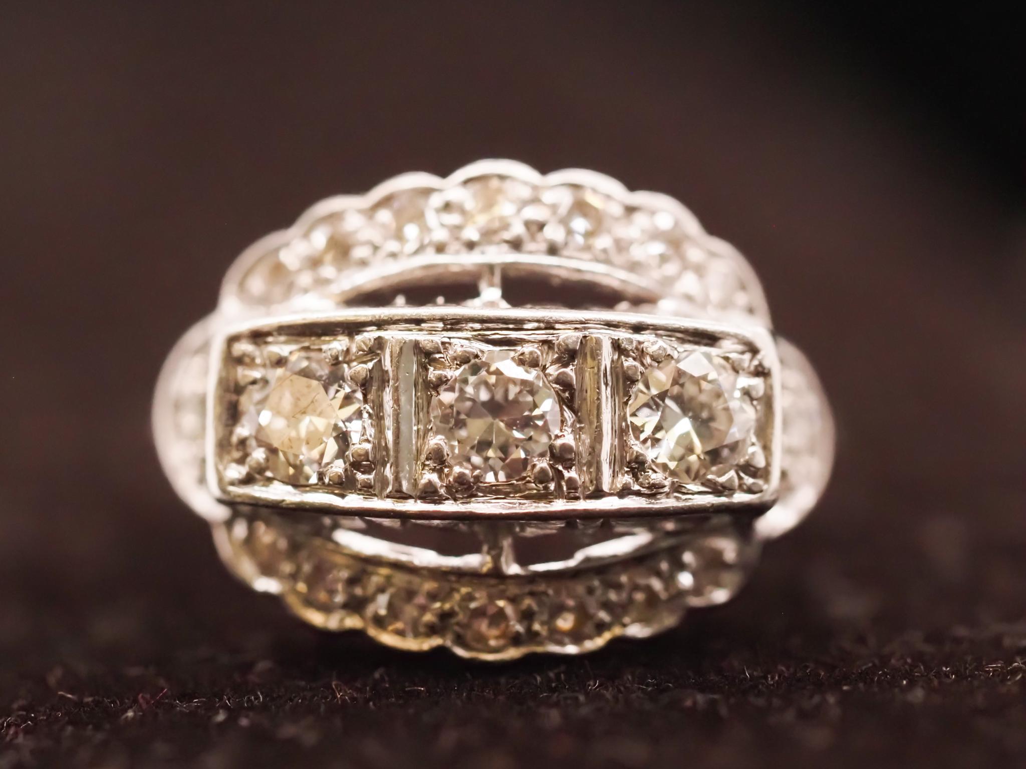 Circa 1930s Platinum Art Deco Three Stone Old European Diamond Ring For Sale 4